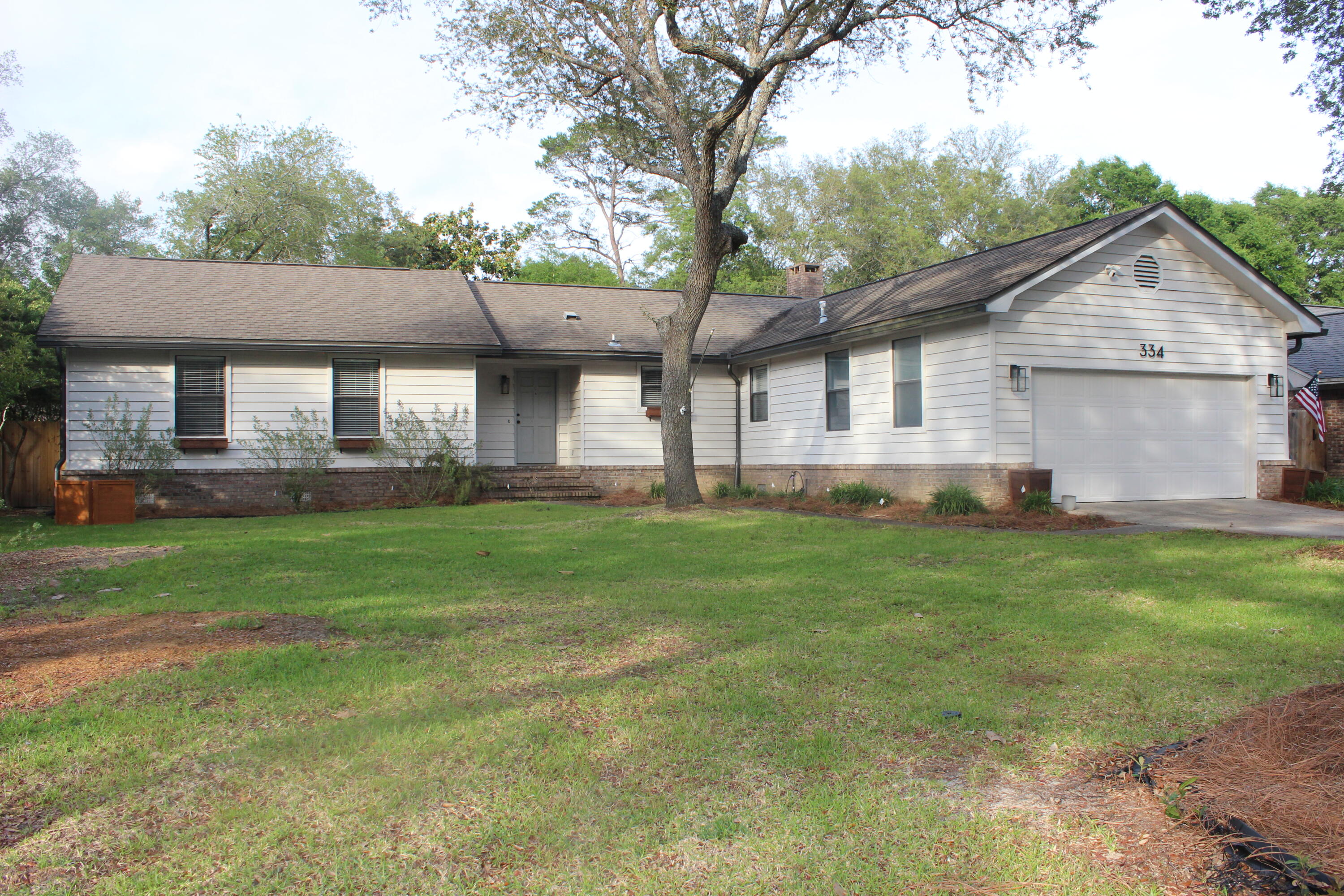 3 bedroom, 2 bath home in desired Bluewater Bay.  Home features hardwood floors through out the living areas and continue down the hall and into the bedrooms. Plenty of storage closets in the foyer, hall and bathroom. The kitchen boasts stainless steel appliances, to include a newer stove and range hood, granite counters and is open to the dining room and family room that features a cozy fireplace. Spacious laundry room with tile flooring. You access this home's backyard through the laundry area. There is a great side deck for entertaining and grilling. Backyard has a fire pit and open space. No smoking or vaping. Dogs only will be considered by owner with a non-refundable pet fee.