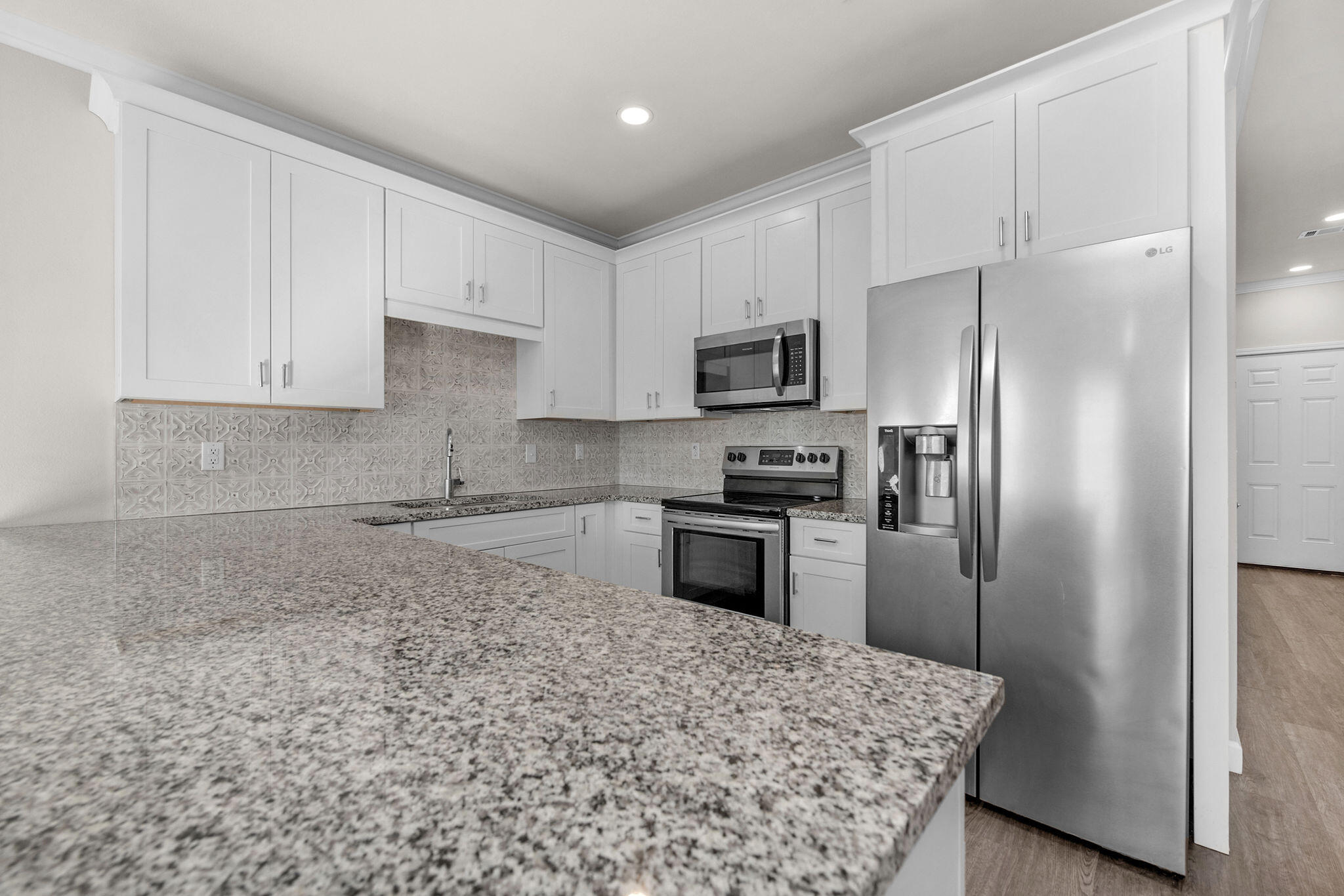 Welcome to this beautifully maintained 3-bedroom, 2.5-bath home ideally located near Hurlburt Field and Eglin AFB. This home offers a thoughtfully designed open floor plan that is perfect for both everyday living and entertaining. The kitchen features granite countertops, stainless steel appliances, ample cabinet space, and flows seamlessly into the main living and dining areas.

Luxury vinyl plank flooring enhances the main living spaces, providing durability and modern style, while generous storage throughout the home adds everyday convenience. The spacious primary suite includes an en-suite bath and walk-in closet, with additional bedrooms offering flexibility for guests, a home office, or a growing family.

Located within a gated, family-friendly