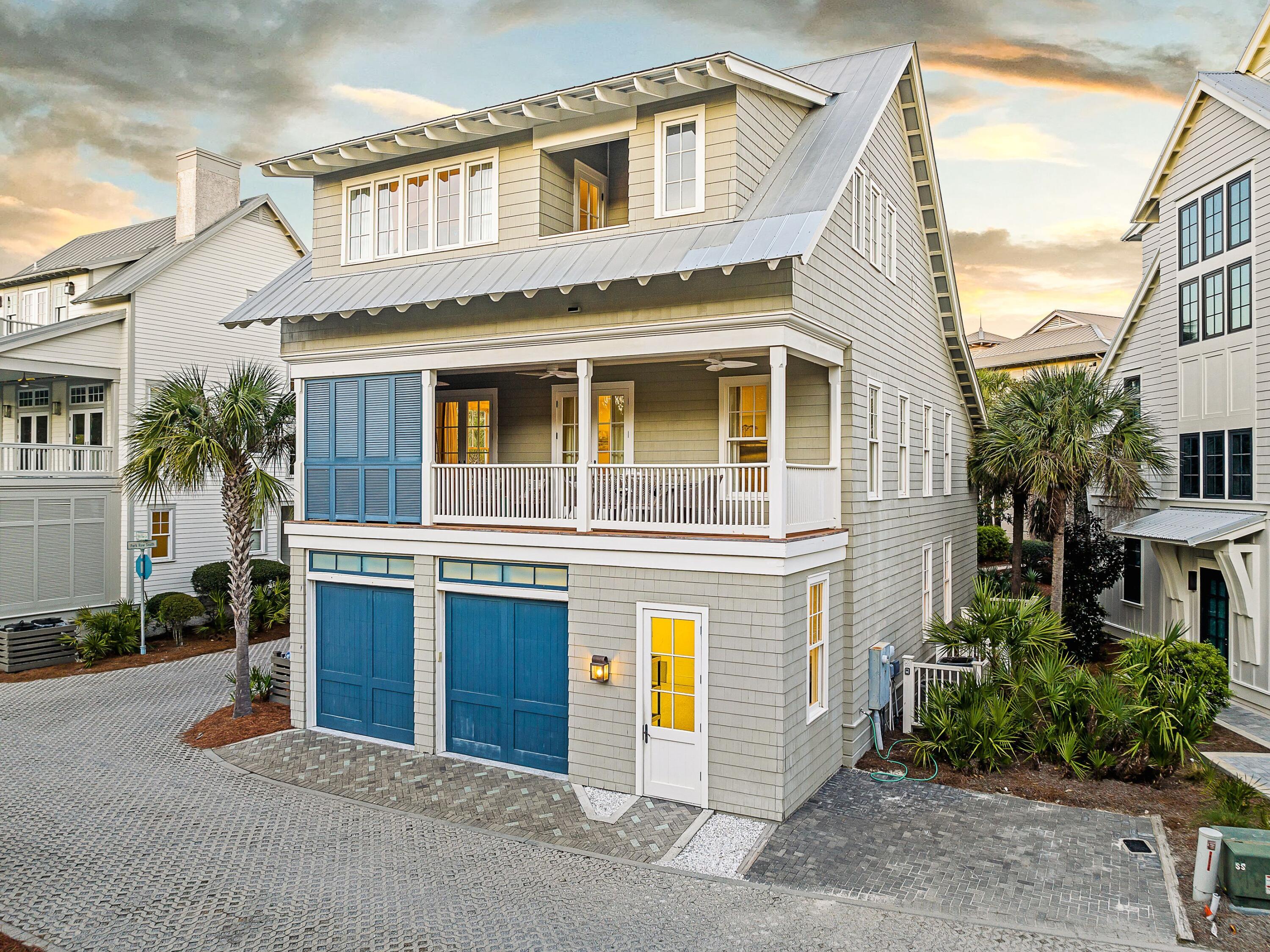 Perfectly positioned just three lots from the Gulf along one of WaterColor's most coveted streets, 105 Park Row Lane captures panoramic Gulf views, exceptional privacy, and direct access to the newly reimagined WaterColor Beach Club. Bordered by protected national forest, this exceptional residence offers a rare blend of refined coastal living and natural seclusion.

Recently refreshed with new interior paint, curated furnishings, and designer décor, the home is offered completely turnkey. Thoughtfully designed across three levels, the residence features four spacious bedrooms plus a sleeper sofa, while expansive second- and third-floor balconies frame sweeping Gulf vistas in one direction and tranquil forest views in the other. The light-filled main living area is designed for effortless entertaining, showcasing vaulted ceilings, custom millwork, designer lighting, and a seamless connection to the chef's kitchen, appointed with marble countertops, premium stainless-steel appliances, and an oversized island. Just beyond, the spacious balcony extends the living space with alfresco dining and a signature hanging daybed.

Just steps from the beach and WaterColor's premier amenities, 105 Park Row Lane presents a rare turnkey opportunity with exceptional rental potential, offering an effortless blend of luxury, location, and timeless appeal along Scenic Highway 30A.