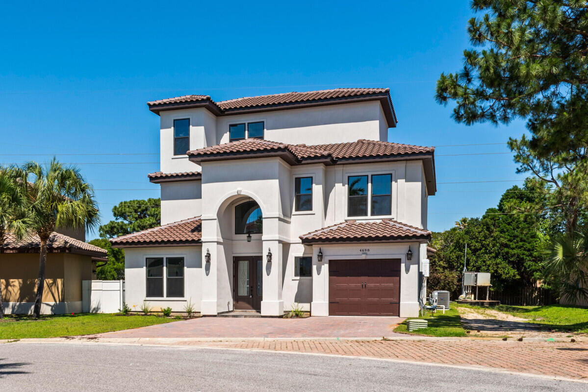 3-Story one of a kind LUXURY home move-in ready! The is the best house in Calusa Bay, come see for yourself. Open plan with 10-foot ceilings, crown molding in common areas, Granite/Quartz countertops and Backsplash, Vented Fireplace in Family Room, Tile Floor in 1st Floor, Hardwood Floors in 2nd and 3rd Floor, ceiling fans in every room. Thor Range, Thor Dishwasher, Thor Wine Cooler, ZLine cabinet Microwave, Dual Fisher Paykel Refrigerator, pot filler, Island is 4'x10' with large Sink. Walk-In Pantry in Kitchen. Foyer entrance has beautiful curved staircase with a modern chandelier. Powder in 1st Floor. Laundry Room in 2nd floor with sink. 2nd Floor has 3 Bedrooms and 2 Full Bathrooms (2 Bedrooms share a bathroom). Large Loft Space with Balcony by staircase in 2nd Floor. Third Floor Master Bedroom with custom mdf Walk-In Closet. Master Bath has double vanity with vessel sinks, Stand Alone Tub, and Large Shower. Covered Patio with custom cabinets, built-in natural gas Grill, granite countertops, and bar sink. 1-car garage with insulated door and belt drive motor. The paver driveway can fit four additional vehicles. Short Term Rentals are NOT allowed per HOA.