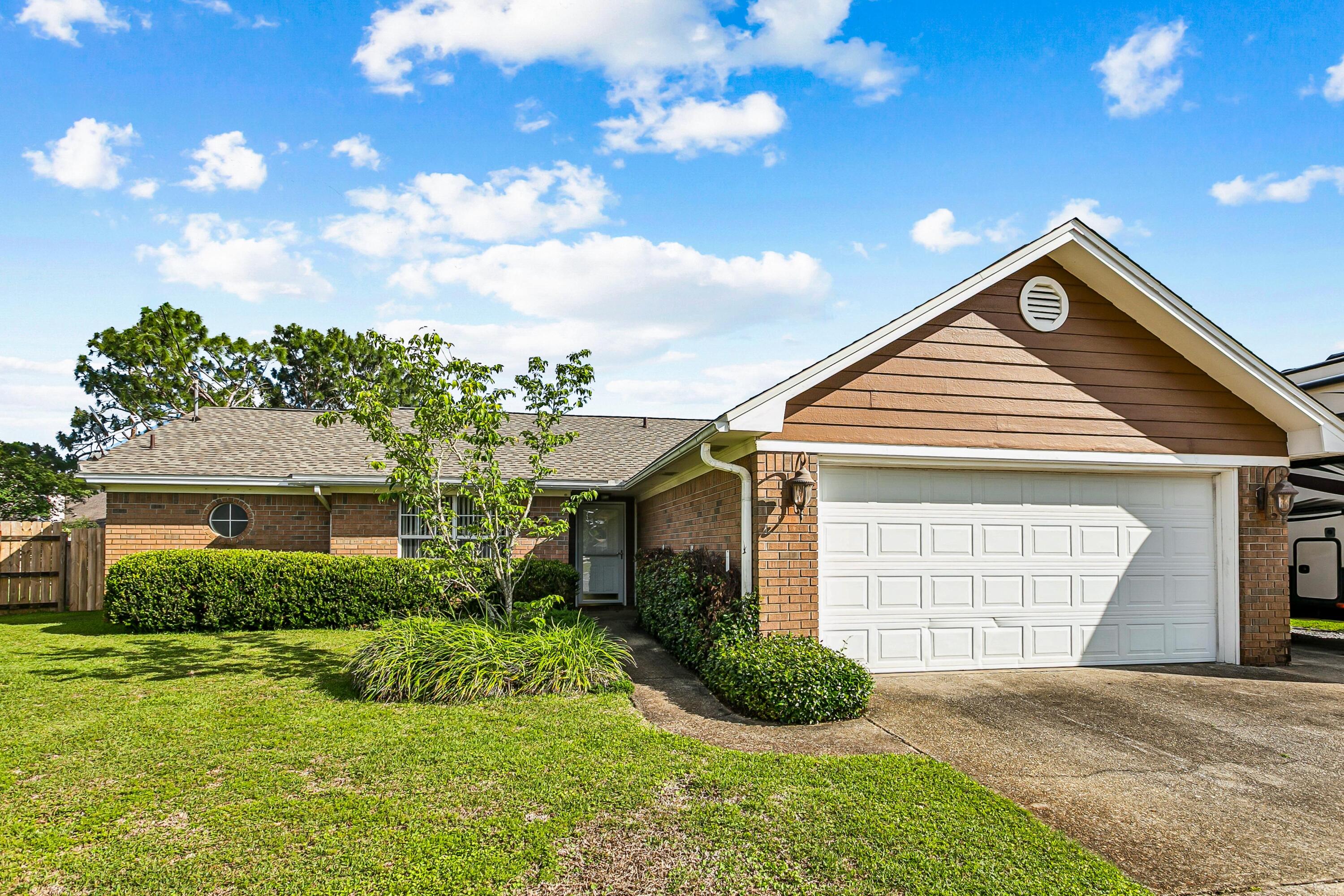 This well-designed home showcases three bedrooms and two bathrooms. The property features paid-off solar panels and geothermal heating and cooling systems, providing eco-friendly and energy-efficient living-FPL bills under $50 per month! The large backyard offers ample space for outdoor enjoyment, while the enclosed porch provides a cozy and protected area for relaxation. The interior of the home is well-maintained and features a dedicated dining area, as well as a split bedroom layout for added privacy. The property has additional space for boat or RV parking and is situated in a cul-de-sac, ensuring a quiet and private setting.