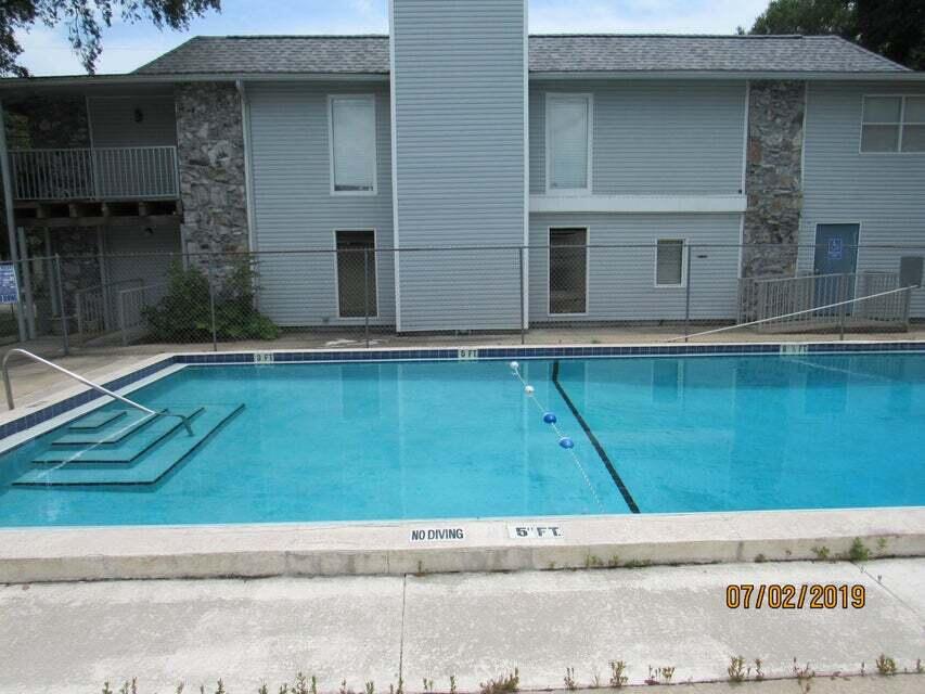 Enjoy comfortable, low-maintenance living in this well-maintained 2-bedroom, 1-bathroom condominium, ideally located in the heart of Niceville. Situated next to Northwest Florida State College and just minutes from military bases, schools, shopping, dining, and the beautiful Emerald Coast beaches, this home offers both convenience and an excellent location.

Inside, you'll find neutral paint and durable tile flooring throughout, with no carpet for easy maintenance. The spacious living room provides a comfortable place to relax or entertain, while the well-equipped kitchen offers everything you need for everyday cooking. Both bedrooms are generously sized and share a full bathroom designed for convenience and functionality.

Rent includes water, garbage service, lawn care, and pool maintenance, making it easy to enjoy a hassle-free lifestyle. Residents also have access to the community swimming pool and convenient on-site laundry facilities (pay-per-use).

Cats may be considered with prior owner approval and a non-refundable pet fee. Smoking and vaping are not permitted.