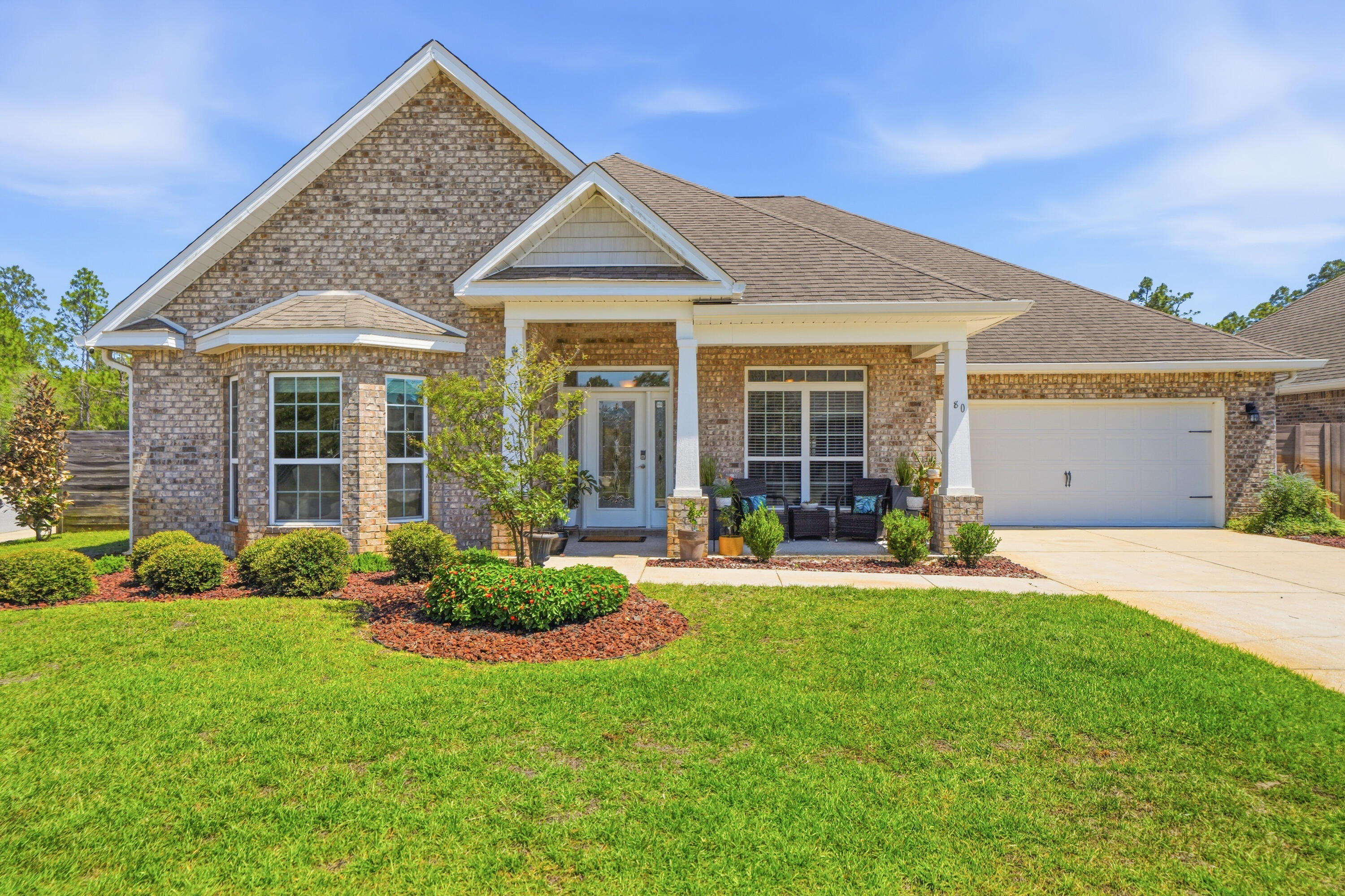 Welcome to 80 Viper Road, a beautifully maintained and thoughtfully upgraded 5-bedroom, 3-bathroom home offering over 3,300 square feet of single-level living space just minutes from the world-famous white-sand beaches and public beach access points of South Walton and the Emerald Coast. 

Designed for both comfort and functionality, this spacious floor plan features a dedicated office, formal dining room, living room, breakfast area, and a bright Florida room/sunroom that adds valuable bonus living space. The well-designed layout offers exceptional privacy, with thoughtfully separated bedroom spaces ideal for entertaining guests, multi-generational living, or growing families.

Throughout the home, you'll find upgraded tile flooring, enhanced ceiling fan fixtures in five rooms, and custom California-style closet systems that maximize organization and storage. The private primary suite serves as a true retreat, complete with a large walk-in closet, California-style built-in storage, and an upgraded en-suite bath featuring both a soaking tub and separate walk-in shower. Two of the home's three bathrooms feature walk-in showers, providing convenience and accessibility for family members and guests alike.

Recent improvements provide outstanding value and peace of mind, including a new HVAC system with heat pump, upgraded water heater (approximately two years old), new dishwasher, termite prevention treatment, Arlo security camera system, and a new irrigation system pump with a rust-prevention upgrade.  

Situated on a desirable corner lot, the property features wraparound sidewalks, a large driveway, two-car garage, and a six-foot wooden privacy fence enclosing a generously sized side and backyard. Enjoy the rare benefit of having no homes directly behind the property, creating a more private and peaceful setting.

Outdoor features include low-maintenance lava rock landscaping beds, freshly treated driveway and sidewalks, and newly installed sod in the backyard, with additional sod installation prepaid and scheduled for completion after closing.

Combining substantial square footage, extensive upgrades, privacy, proximity to South Walton's beaches, and a highly functional floor plan, this move-in-ready home offers an exceptional opportunity for those seeking space, comfort, and modern convenience along Florida's Emerald Coast. Schedule a showing today!
