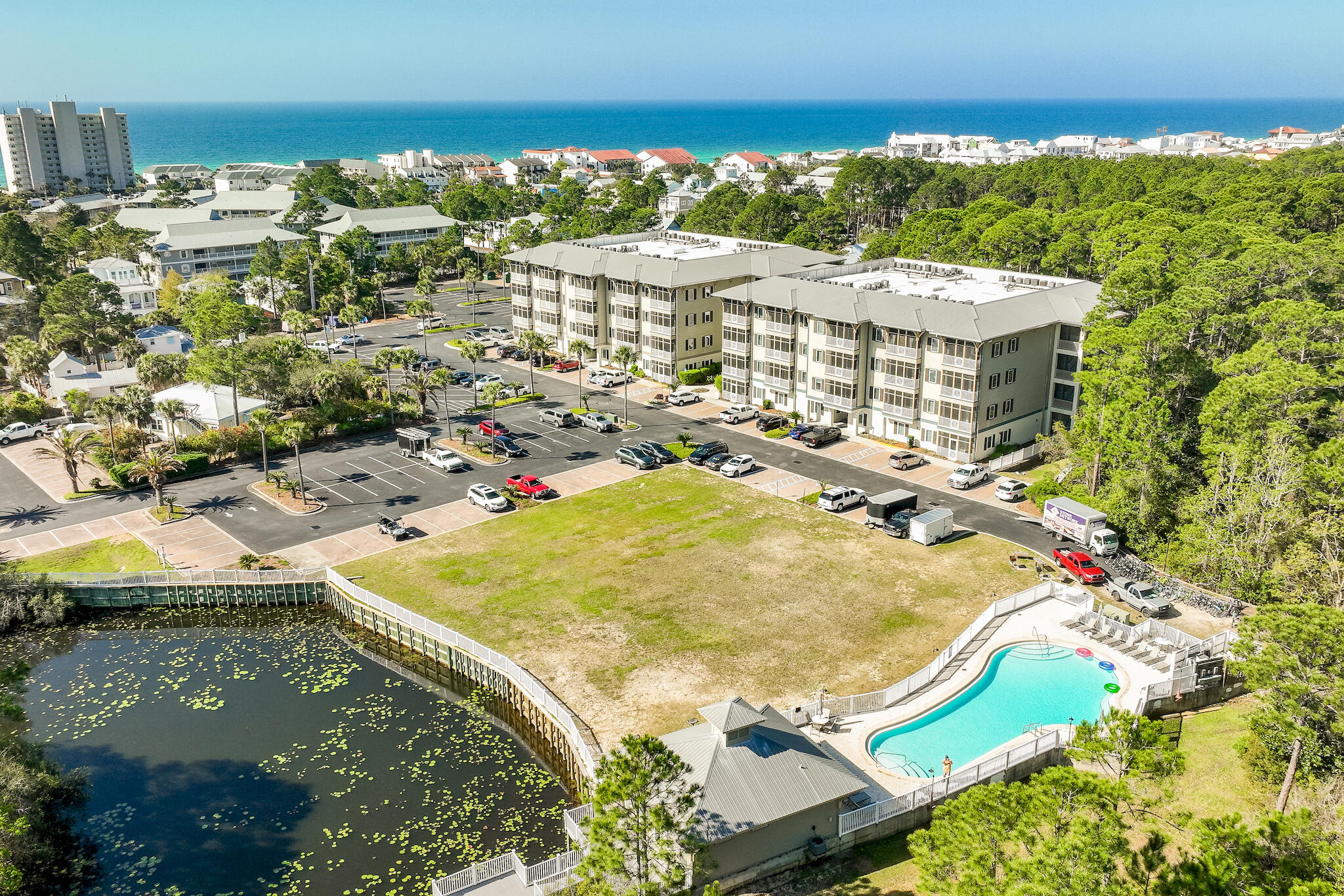 Tucked in the heart of Seagrove Beach along Scenic Highway 30A, this Seagrove Highlands retreat offers the kind of ease owners and guests are searching for. With the recently opened beach access nearby, getting your toes in the sand just got even easier.

Inside, soaring ceilings and an open layout create a bright, airy feel that lives larger than expected. Natural light pours through French doors and oversized windows, giving the living space a warm, inviting feel perfect for gathering after a day at the beach.

With three bedrooms, including a thoughtfully designed bunk room that comfortably accommodates extra guests, this condo is set up for both personal enjoyment and strong rental appeal. Whether hosting family, kids, or friends, there is room for everyone to spread out and enjoy the 30A lifestyle.

Step onto the private screened balcony for morning coffee, evening cocktails, or a quiet moment to unwind after a day on the beach. You'll absolutely fall in love with the open kitchen, where sleek modern white cabinets shimmer in harmony with stainless steel appliances. The center island, complete with cozy seating for two, is the perfect spot to enjoy a leisurely morning coffee or whip up delicious snacks for family and friends!

As you retreat to the luxurious primary suite, tranquility envelops you in this peaceful oasis. This stunning sanctuary boasts a lavish private bathroom equipped with a spacious walk-in shower, a double vanity, and a bathtub that invites you to soak away the stresses of the day. In addition to the primary suite, this unit also features two guest bedrooms and another bathroom. With coastal decor and LVP flooring throughout, you'll immediately sense the elegance and comfort in every corner.

And that's just the beginning! This unit comes fully furnished and rental-ready, complete with an awesome 6-seater golf cart to cruise around 30A in style! 

But wait, there's more! Dive into the array of fantastic amenities, including a clubhouse, a charming pier overlooking the lake, a refreshing swimming pool perfect for those sunny days, and walking trails that beckon you to explore the natural beauty that surrounds you. Ideal for those seeking an active lifestyle, you'll find yourself just moments away from not one, but two public beach accesses! 

All information is believed to be correct; buyer to verify all information in the MLS listing.