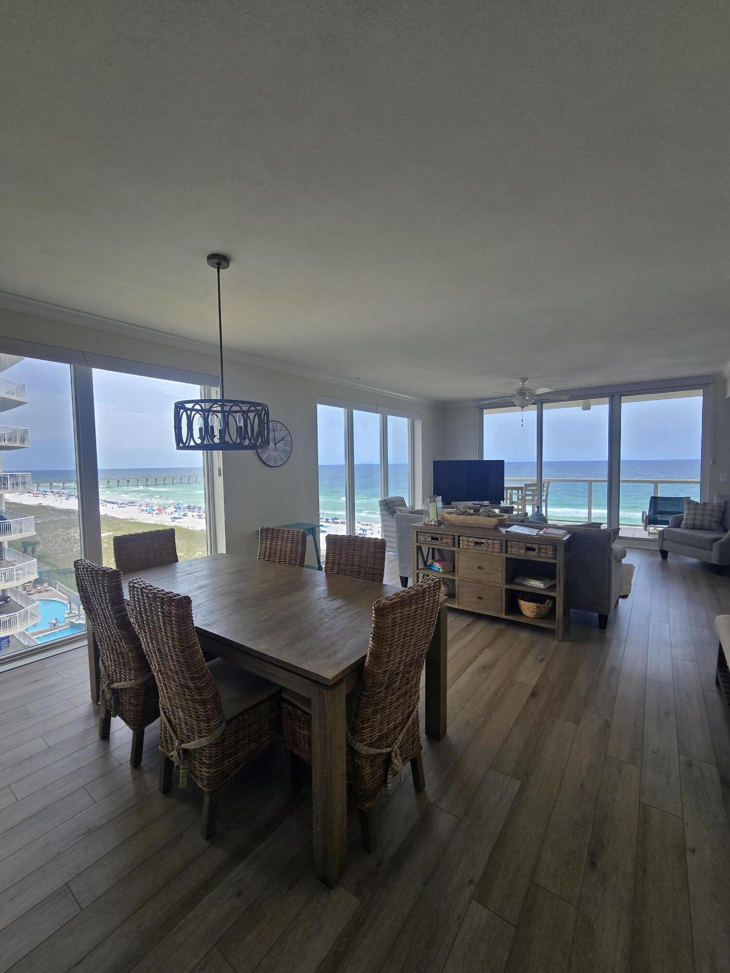 Professional photos coming soon!

You have discovered your Gulf front oasis on beautiful Navarre Beach!
 
Welcome to 8477 Gulf Blvd, an exceptionally renovated, fully furnished condo offering modern comfort and breathtaking coastal living on Navarre Beach. Desirably situated on the 6th floor and east corner of the building, this spacious 1,824-square-foot residence will stun you with unforgettable Gulf and Navarre Beach Pier views the moment you enter. This unit boasts 3 full ensuite bedrooms and 3 bathrooms - one a possible lock out unit - providing ample space for separation, relaxation and hosting guests.

This condo has undergone a total renovation, featuring elegant LVP floors throughout; a soothing pallette; gorgeous window treatments (including automatic shades); high end coastal furnishings and finishes; plus, all around inviting natural light with floor to ceiling windows. The kitchen is thoughtfully updated with a breakfast bar, pantry, stainless steel appliances/ finishes and coastal inspred backsplash. The dining area further enhances the coastal charm with the large table and coastal chic chandelier, offering an ideal setting for meals with an incredible view. Bathrooms offer luxurious tiled showers/ tubs, and bedrooms are tastefully decorated with modern touches.

Step onto your private Gulf front balcony and take in the stunning views while enjoying peaceful moments outdoors, complete with gentle breezes and possible sightings of the vibrant marine life in the Gulf. The balcony is accessed via the living area and the primary suite. A separate balcony offers a lovely waterfront view of the Santa Rosa Sound from the 3rd bedroom and possible lock out unit. 

For your convenience, the condo includes an in unit washer and dryer and recently replaced AC and hot water heater. Building amenities include an elevator and  a sparkling pool, perfect for unwinding after a long day.

Located directly on the Gulf, this beachside condo is perfectly designed for both everyday living and a luxurious retreat. Whether you're relaxing inside or relishing the outdoor serenity, this condo encompasses everything you need for the ultimate coastal lifestyle. Don't miss the chance to make this incredible property yours--schedule a showing today!