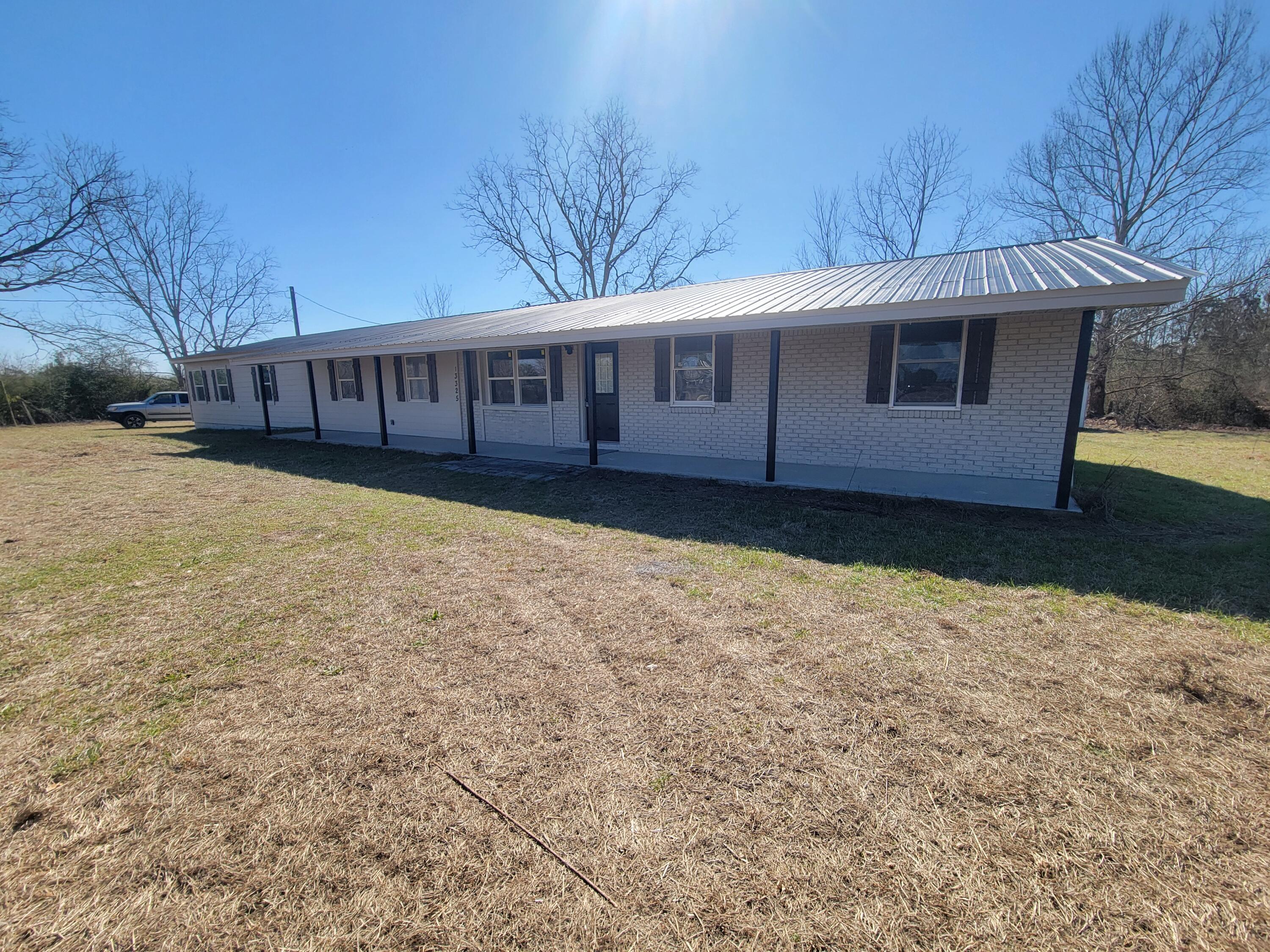Like new this recently renovated country home on one acre (1) just north of DeFuniak Springs. If you are looking for a large  4 bedrooms and 2 bathrooms that feels like new with appx. 2120 sf. you should put this one on the list.   Home has been totally renovated and updated with spacious kitchen/Dining room 18'x24' with lots of cabinets and countertops including a new breakfast bar.  Master Bedroom is super-sized for homes in this price range.  Master Bath has walk-in shower, double vanities, closet with cabinets/drawers that should easily help with organizing.  Master Bedroom also has an exit door to a brand new deck, perfect for sipping morning coffees.  A second deck off the kitchen to watch the kids or pups play.  This home is a split floor plan with other full bath and bedrooms on the other end of the home.  Home has two (2) new split-air and heating units.  Separate storage building.  NO HOA.  The FL beaches are only 45 minutes away and I-10 access 20 minutes.  Be sure to look under Document Tab -  for new survey, 4 Pt. Inspection and Wind Mitigation Report, Easy to view