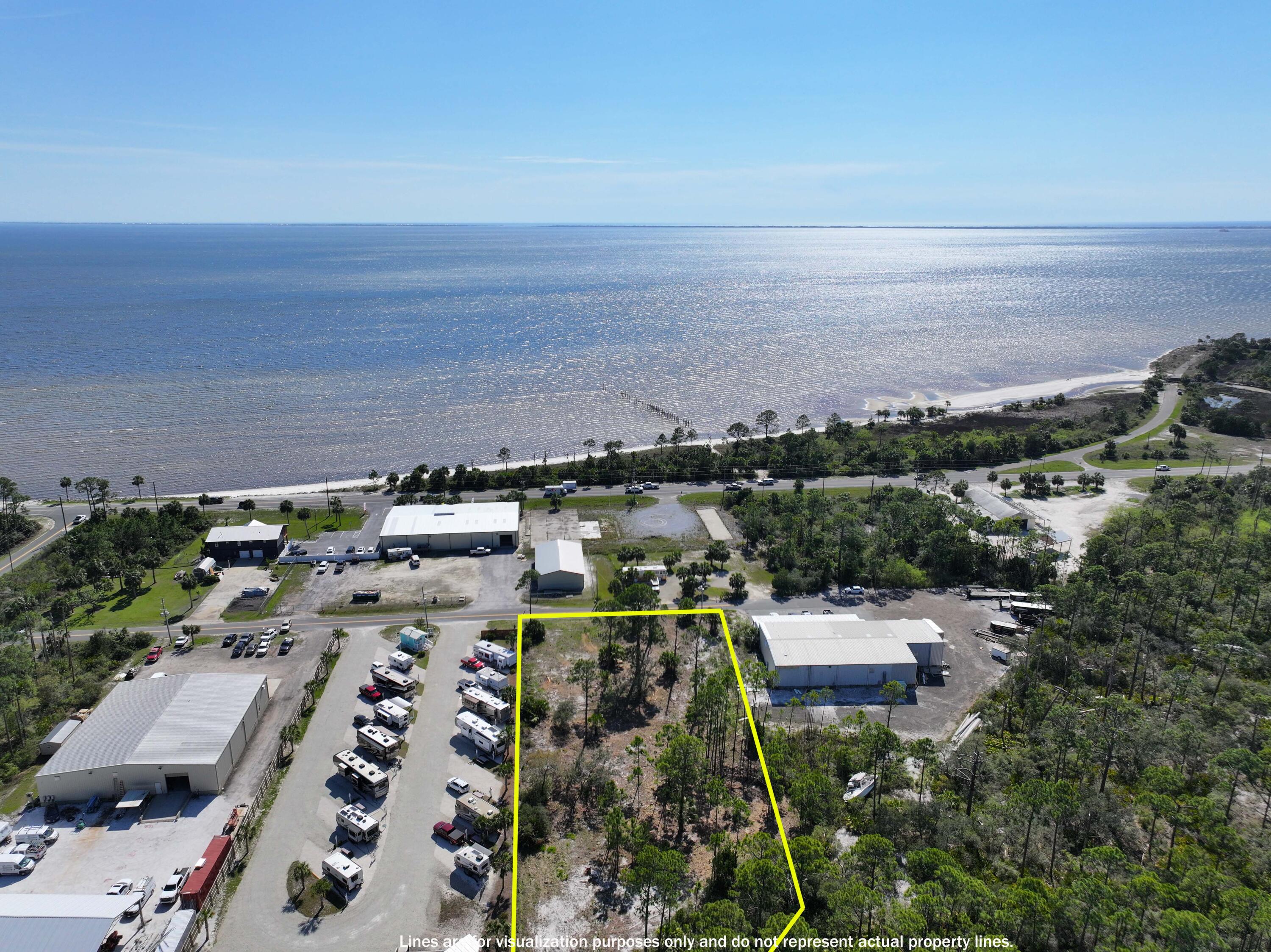 Are you looking for the perfect site for your next venture or development opportunity?

These two adjoining lots, being sold together, total just under 1.2 acres and offer exceptional flexibility with both commercial and residential potential. From a residential standpoint, the property allows for up to four separate homesites, making it an attractive option for builders, investors, or those looking to create a private coastal compound. On the commercial side, the zoning opens the door to a wide range of possibilities for business use, providing long-term upside in a growing area.

Situated in a peaceful coastal setting, the property offers convenient access to nearby beaches, boat launches, and the charm of downtown Port St. Joe. Its proximity to the main corridor allows for easy accessibility while still maintaining a quiet, laid-back environment that defines Florida's Forgotten Coast.

With ample space and flexibility to design your vision--whether residential, commercial, or a combination of both--this property presents a unique opportunity for personal use, investment, or future development.

Build your future along Florida's Forgotten Coast.
This listing is for two Parcels: 04539-005R,  
04539-010R