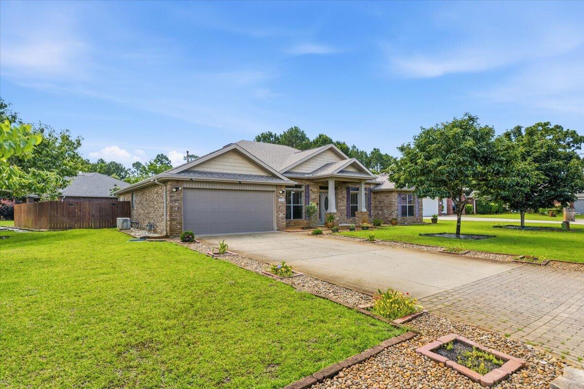 BRAND-NEW ROOF, PAID-OFF SOLAR PANELS WITH NEW WIRING, AND HOME GENERATOR WITH REMAINING WARRANTY! Enjoy energy-efficient living with virtually no electric bill and low gas costs in this beautifully maintained home located in The Meadows, one of East Navarre's most desirable neighborhoods, featuring underground gas and electric utilities for a clean and attractive streetscape with low HOA.

Situated on a premium corner lot in a quiet cul-de-sac, this 4-bedroom, 3-bath home offers an ideal location for commuters--just 8 miles from Hurlburt Field, 4.5 miles from Navarre Beach, and minutes from Publix, Walmart, restaurants, and everyday conveniences.

The spacious floor plan features an oversized formal dining room and a large kitchen with granite countertops, a center island, abundant cabinetry, and a walk-in pantry. The laundry room includes a utility sink, and the washer, dryer, and all kitchen appliances convey with the home.

The primary suite and one guest bedroom both offer direct access to the back patio. Step outside to enjoy the freshly sodded backyard, beautifully landscaped with mature fruit trees including mulberry, peach, blueberry, chestnut, and persimmon. This private outdoor oasis provides the perfect setting to relax and enjoy Florida living.

Additional upgrades include a fully renovated guest bathroom, cultured marble vanity tops throughout, seamless gutters, and a gas stove. The new roof includes a transferable 5-year workmanship warranty, providing added peace of mind for the next owner and transferable termite bond as well.

Move-in ready and located in a beautiful, quiet neighborhood, this exceptional home offers comfort, convenience, energy efficiency, and value all in one package.