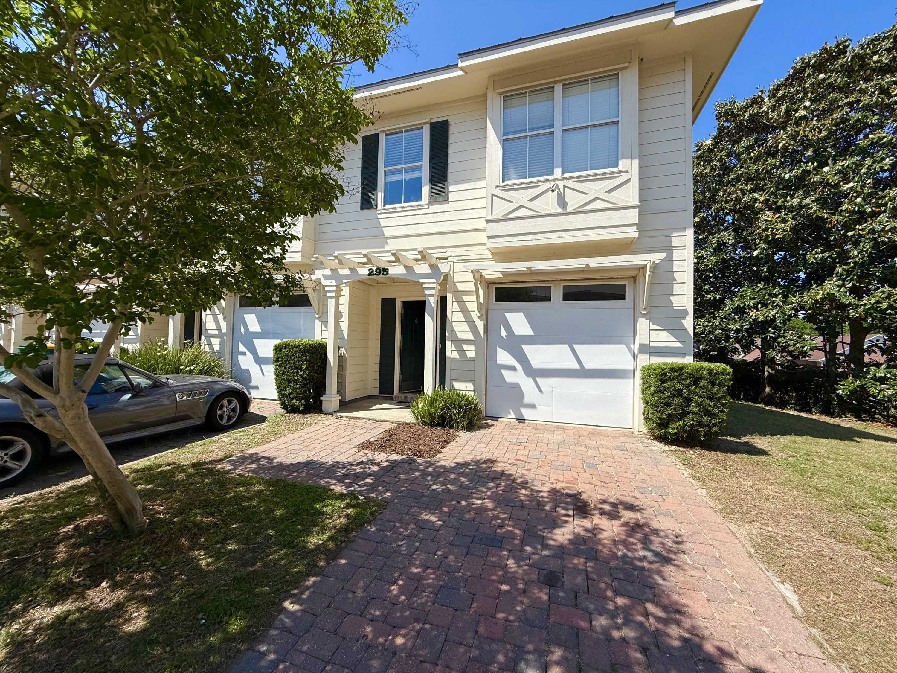 SELLER offering a unit painting concession with an acceptable offer! COVETED CORNER UNIT! BRAND NEW A/C INSIDE & OUT! 295 Mattie M. Kelly Blvd. delivers an unbeatable combination of location, value, and lifestyle on the Emerald Coast. Tucked just off Airport Road, this charming townhome offers effortless access to the beach and an array of local attractions--all within minutes. A standout feature is the back-road access, enabling you to skip Hwy 98 and quickly reach hotspots like Destin Harbor, Destin Commons, June White Decker Park, Henderson State Park, Joe's Bayou, and major conveniences like Publix, Winn Dixie, and countless dining and shopping options.

Perfect as a primary residence or a savvy long-term rental investment, this property has been thoughtfully updated to blend comfort and style. Recent renovations include durable, modern Luxury Vinyl Plank flooring throughout and brand-new HVAC system (inside and out) installed in 2026, and the hot water heater was replaced in the last few years, so ensuring peace of mind for years to come.

Inside, the first floor boasts high ceilings, and a spacious, open-concept living room with a seamless pass-through to the kitchen. The kitchen is both functional and stylish, featuring granite countertops, ample cabinetry, and a pantry for extra storage. Step outside from the living room onto a generous back porch--ideal for relaxing or entertaining--or enjoy the convenience of a highly sought-after 1-car garage. Upstairs, you'll find all three bedrooms, including a generously sized Master Suite with a walk-in closet and an expansive Master Bathroom. The second floor also includes a full guest bathroom and a large laundry room with built-in shelving. All of these luxuries in unit 295 are a rare convenience at this price point.

295 Mattie M. Kelly Blvd. is truly a hidden gem, offering the perfect blend of modern upgrades, unbeatable location, and exceptional value. Whether you're looking for a full-time home or a lucrative investment property, this townhome checks all the boxes. Don't miss your chance to see it for yourself--contact Michael Tucker today to schedule your private showing!