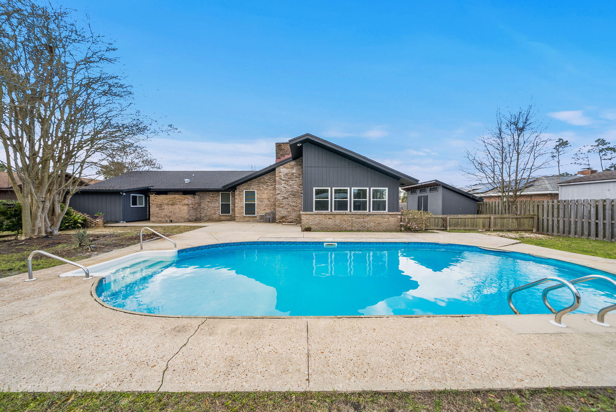 One level. One Owner. Built to be lived in and loved for generations. This WATERFRONT OPPORTUNITY now offers a brighter, more inviting feel. The interior and exterior enhancements complements the home's true coastal culture with a private pool, canal frontage, and a covered dock--perfect for fishing, boating, and unwinding by the water. Pack your picnic and head over to Shell Island. The residence features 4 bedrooms and 2.5 baths, including a flex room conveniently located just inside the entry from the drive-through garage, opening on both sides to create a porte-cochère style arrival and exit. No HOA
This NorthShore waterfront home is ready for its next chapter and offers an exceptional opportunity along the Emerald Coast.