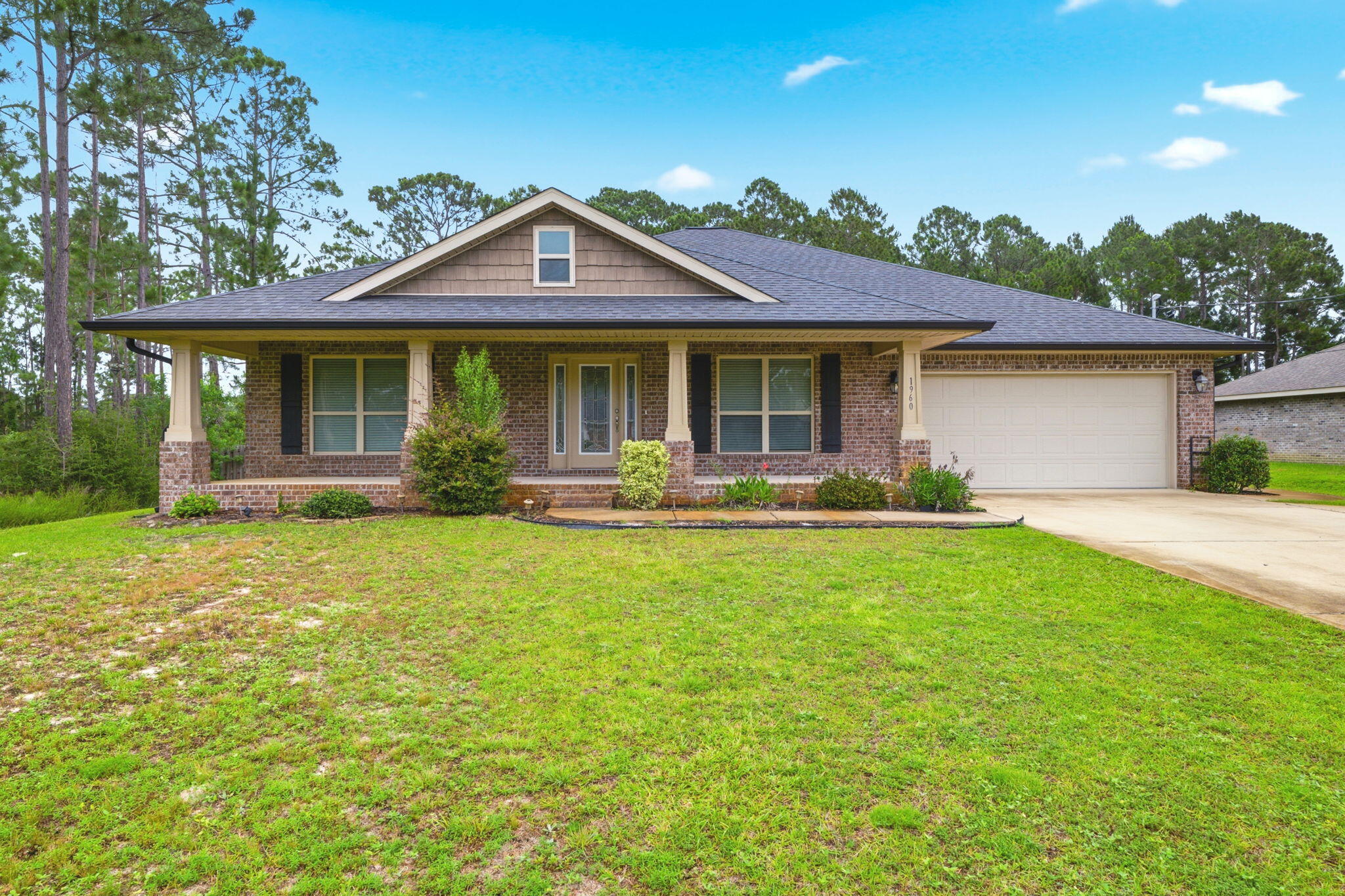 NEW UPDATE! 3.6% ASSUMABLE RATE and SOLAR payoff negotiable (electric bill around $50 per month for this 5 bedroom home) 

Welcome to one of Navarre's rare opportunities to own a spacious five-bedroom, three-bathroom Craftsman-style home situated on an oversized .55-acre corner lot in the highly sought-after Holley By The Sea community. 

Offering over 2,700 square feet of single-level living space, this thoughtfully designed residence combines comfort, functionality, and privacy in one exceptional package.

Step outside and discover a backyard retreat framed by mature trees, creating a peaceful setting with abundant privacy. The expansive lot offers plenty of room to design your dream pool, outdoor entertaining area, or backyard oasis. A storage shed also conveys with the property, providing additional space for tools, hobbies, and outdoor equipment.

Built less than six years ago, this well-maintained home features neutral exterior colors, attractive Craftsman architecture, a long driveway with ample parking, and sidewalks leading throughout the neighborhood. Positioned on an elevated homesite, the property enjoys excellent drainage and added peace of mind during Florida's rainy seasons.

The seller has invested in solar panels that will be paid in full at closing, allowing the new owner to immediately enjoy the benefit of reduced monthly utility expenses without assuming any solar loan obligation. Residents of Holley By The Sea enjoy access to one of the Emerald Coast's most impressive amenity packages, including three swimming pools, tennis courts, pickleball courts, a fitness center, sauna, steam room, boat launch, fishing pier, playgrounds, and numerous recreational activities, all while maintaining a low annual HOA fee.

Conveniently located on the west end of Navarre, this property offers quick access to Highway 98 via a nearby traffic light, making daily commutes, shopping, dining, military bases, and the beautiful white-sand beaches of the Emerald Coast easily accessible.

Recently vacated and move-in ready, this home is available just in time for the upcoming school year. Five-bedroom homes on over half an acre are seldom available in this are...don't miss your opportunity to make this exceptional property your next home. Be sure to watch for upcoming open house dates and private tour opportunities.

Ask to view the document section for your thorough review!