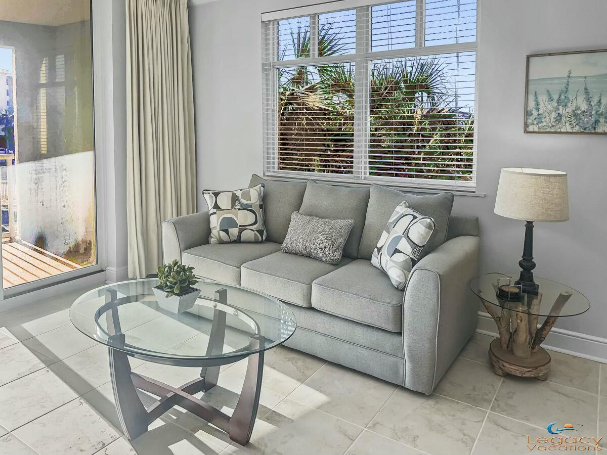 PRICE REDUCED. Last time an Azure unit was purchased below $600,000 was 2021. This unit can yours at 2021 pricing.  DON'T MISS THIS INCREDIBLE PRICE on Okaloosa Island's Premier Beach Front Investment & Vacation Retreat. Experience Luxury Coastal Living at its finest. This 3 B/R 2 B/A End Unit boasts classic Mediterranean Architecture, 9' Ceilings, and Floor-To-Ceiling Sliding Glass Doors opening to an 8'x15' Private Balcony with stunning beach views. Additional End-Unit Windows fill the space with natural light, creating a bright and welcoming atmosphere. Inside, enjoy a full suite of Stainless Steel Appliances, Granite Countertops, and modern finishes throughout. Just steps from restaurants, shopping, the Boardwalk, and the Pier, - 515 of Private Sugar White Sand. Resort Style Amenities include two Expansive Pools (one heated in cooler months) two Hot Tubs, and the Island's largest beachfront Fitness Center. Invest with confidence: the entire Azure Condominium building and parking decks have just undergone a $3,000,000 restoration, fully paid by the current owner. This renovation positions Azure as the Finest Property on Okaloosa Island, making it a true turnkey vacation Rental or Investment Opportunity. Don't miss your chance to won a piece of the Island's most coveted address.