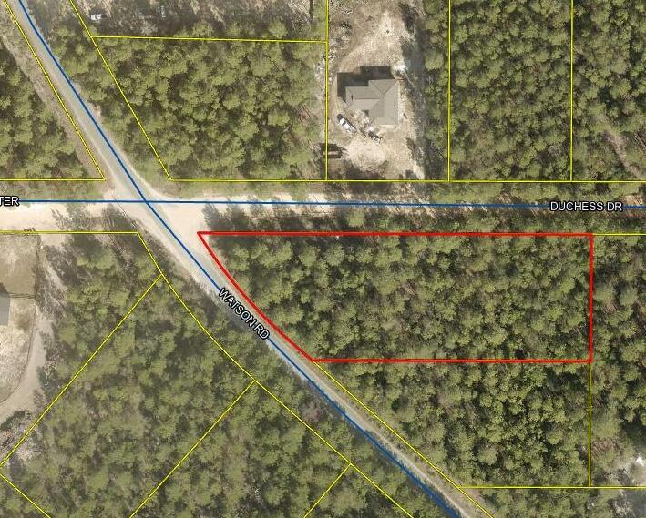 Discover the perfect blend of privacy and convenience with this beautiful 1.464-acre corner lot in a quiet country setting. This wooded parcel offers a peaceful, natural backdrop while still providing easy access via paved road frontage. No utilities are currently in place, giving you the flexibility to develop the property to suit your needs. Mobile homes are allowed, offering a variety of options for building or placing your home.

Enjoy the tranquility of rural living while being just a 45-minute drive to the stunning white-sand beaches of Destin. Whether you're looking to build, invest, or create a weekend retreat, this property offers endless potential in a desirable location. Call today for a private showing!