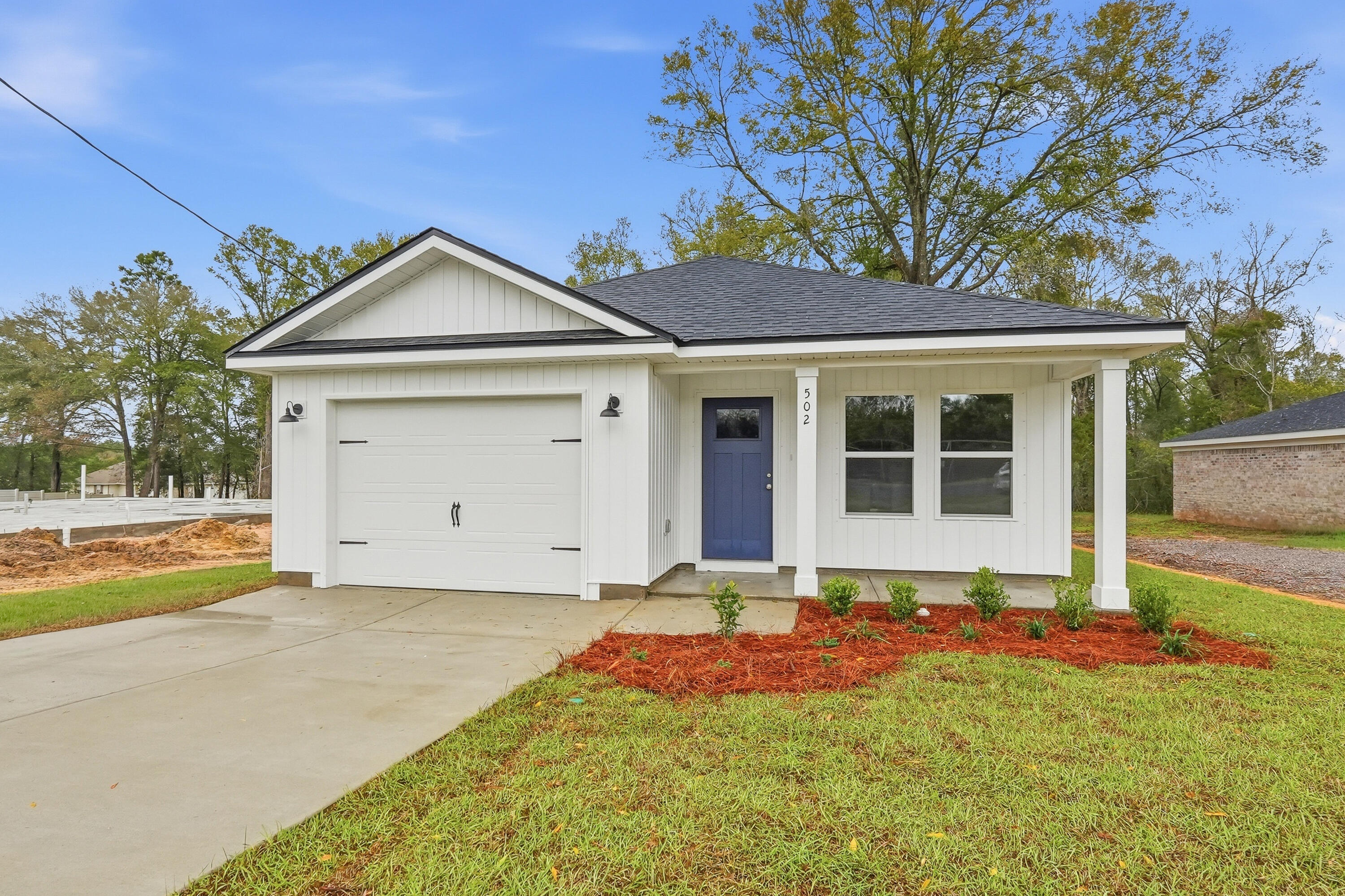 IT'S MARCH MADNESS - $15,000 TOWARDS CLOSING COSTS, FREE REFRIGERATOR, WASHER/DRYER/BLINDS - MUST CLOSE BY APRIL 15, 2026.  Location and convenience in all directions!  Craftsman style home will have fully landscaped yard with privacy fencing in rear, finished 1-car-garage, rear porch for relaxing!
Luxury vinyl plank flooring throughout, quartz countertops, white shaker cabinets, ceiling fans, raised ceilings & recessed lighting.  Kitchen features work island w/bar seating + cozy dining area, walk-in pantry as well.  Owner's bath has double vanities, linen storage, walk-in closet, shower only.