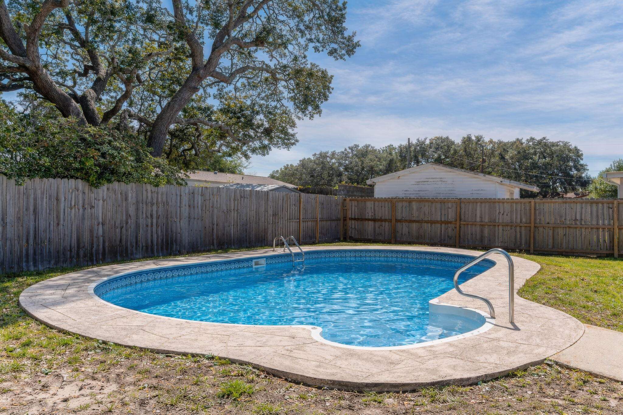 ** Under Contract with a 72-Hour Kickout Clause ** Summer is just around the corner, and this beautifully updated 4-bedroom, 2-bath home is ready to enjoy with a sparkling pool featuring a BRAND NEW POOL LINER! Whether hosting gatherings or relaxing poolside, the backyard offers a private setting with a fully fenced yard and a screened porch for shaded comfort.

Extensively remodeled in 2022, the updates included a new roof, refreshed exterior paint, repaired sprinkler system with added timer, and new windows throughout. Inside, the open and bright floor plan showcases new drywall, fresh interior paint, updated flooring, new appliances, and updated lighting, including ceiling fans. Additional improvements include new A/C ductwork throughout the home and a 50-gallon water heater. With thoughtful updates inside and out, this property offers modern finishes, functional upgrades, and inviting outdoor living spaces designed for everyday comfort and seasonal enjoyment.

Not one, but TWO storage buildings in the backyard for all of your yard tools and weekend toys.

Perfectly situated between both Eglin Air Force Base and Hurlbert Field, this gem offers relaxed living paired with convenience. 

If you sleep on it, you won't sleep in it! Book your showing appointment before this one is gone!