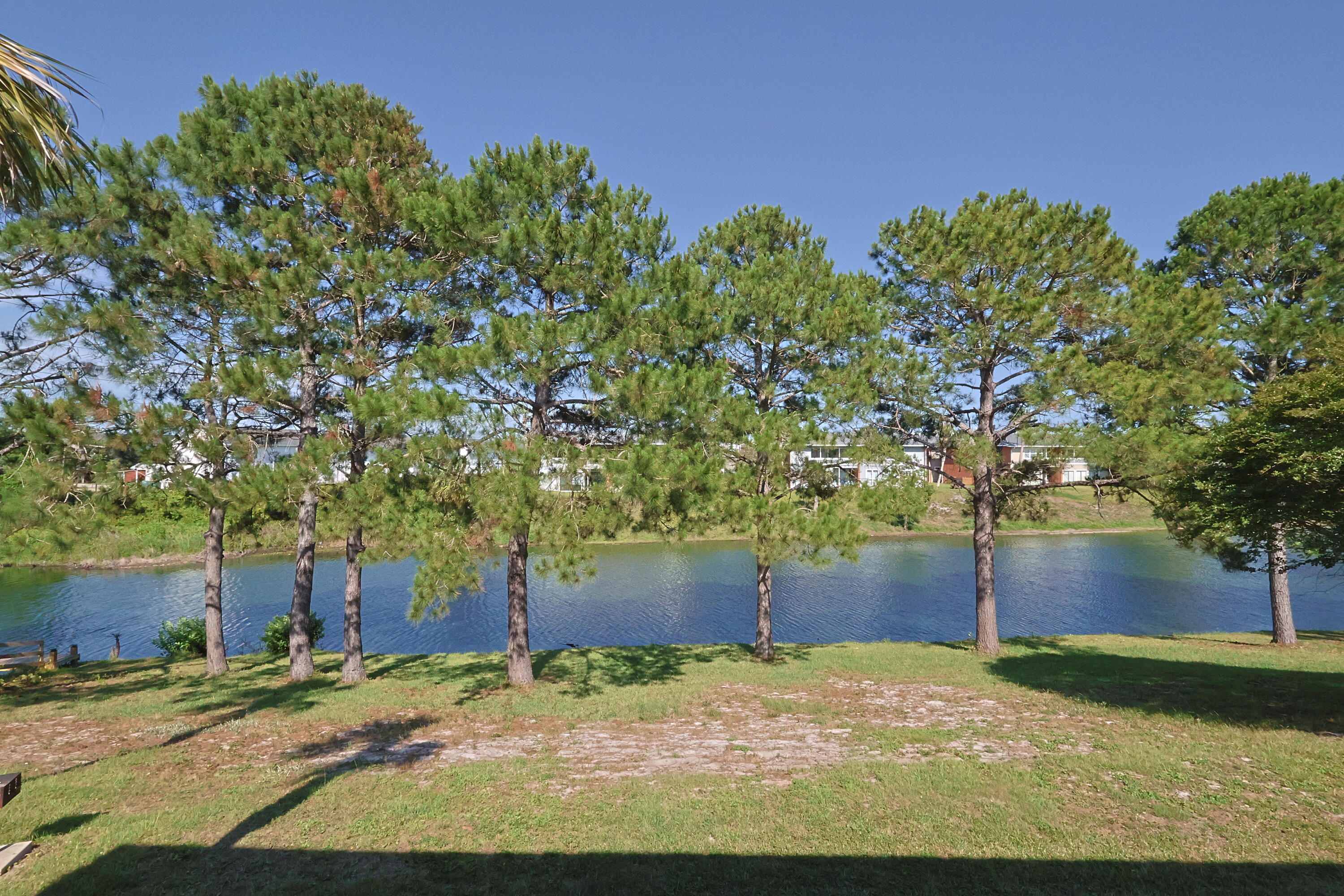Fully furnished and rental-ready! This 2 bed, 2 bath unit features dual walk-in showers, a coffee bar, and carpet in most areas. Located in the private part of Gulf Terrace, this unit is clean, comfortable, and move-in ready and best of all has a beautiful view of the lake and green belts. Located in a well-maintained community with 3 pools, a tennis court, and grill/picnic areas—many of which have been renovated.  Just 0.5 mi to Big Kahuna's, 0.8 mi to Publix & Target, less than 1 mi to beach access, and 2 mi to Destin Commons. Great for short- or long-term stays! Buyer to verify all measurements and pertinent information. Schedule your private showing today.