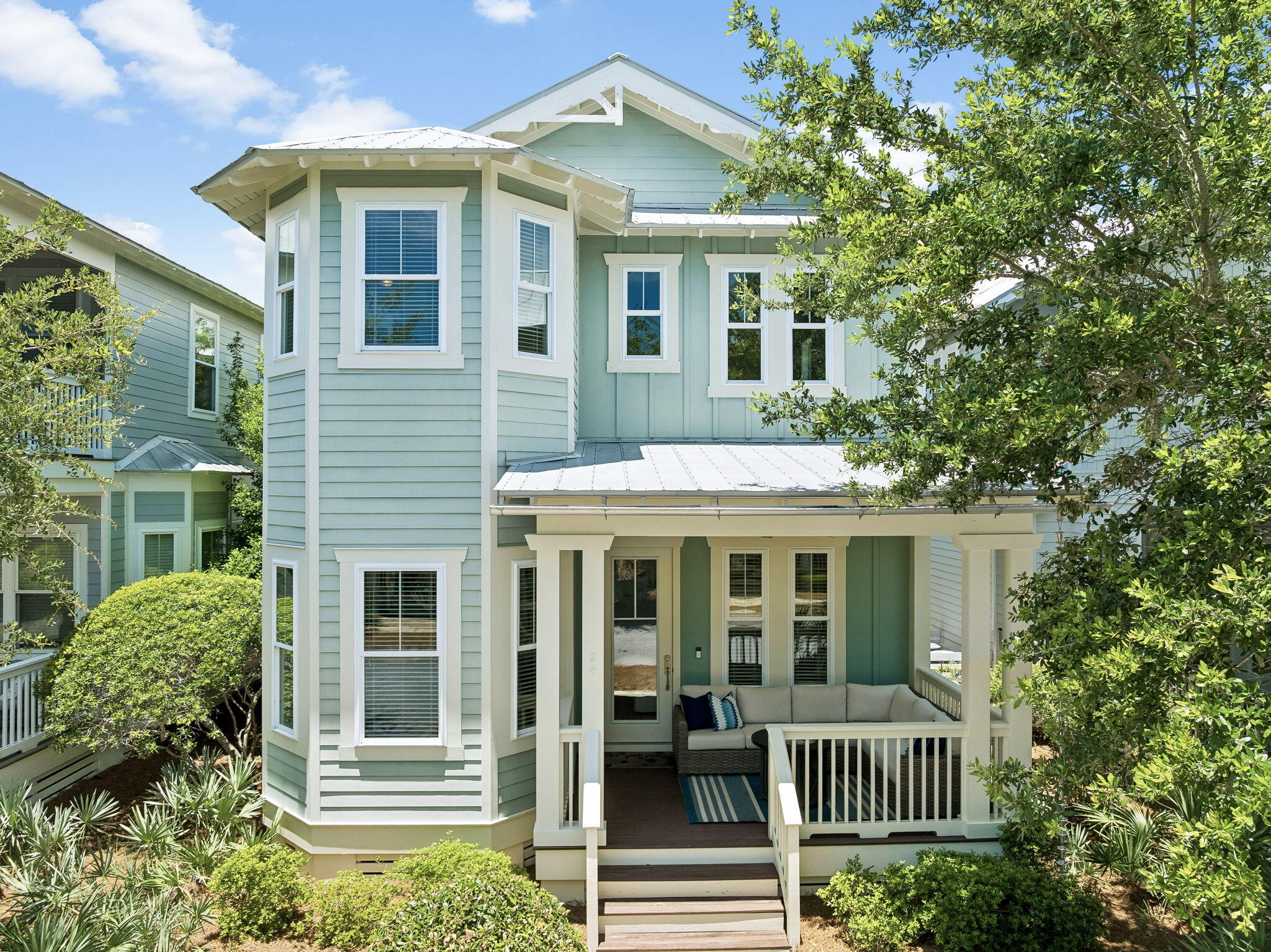 Here's the one you've been waiting for! Homes offering this combination of price, location, condition, and features in NatureWalk at Seagrove are few and far between, making this an exceptional opportunity.
Perfectly positioned on one of the community's most established streets with mature landscaping, this beautifully maintained home backs to a wooded park, offering privacy and a peaceful setting rarely found in the neighborhood. Located toward the front of NatureWalk, you'll enjoy easy access to Seaside, WaterColor, and the beaches of 30A, while being just steps from The Gathering Place and the community's exceptional amenities.
Offered fully furnished and including a 6-seat golf cart, this turnkey property has been lovingly cared for by its owners and has not been on a rental program. Immaculate inside and out, the home features gorgeous solid pine floors that were refinished in 2022, along with newer HVAC systems for added peace of mind.
One of the home's most desirable features is its rare floor plan with a soaring two-story living room that fills the space with natural light and creates an open, inviting atmosphere. The cozy front porch is designed for year-round enjoyment, complete with a gas fire pit. During the cooler months, the lower winter sun naturally warms the porch, while summer's higher sun provides comfortable shade, making it the perfect place to relax and unwind on this quiet street. The first floor offers a spacious primary suite with a spa-like bathroom featuring a soaking tub, separate shower, dual vanities, and a large walk-in closet. A portion of the closet can easily function as an owner's lockout, providing added flexibility.
Upstairs is the ideal retreat for kids or visiting guests. An open loft area with a sofa and TV creates a secondary living space just off the bunk room, which features custom barn doors and accommodates four with two twin-over-twin bunk beds. Also upstairs is a second guest suite with access to a shared bath and a private porch where you can enjoy stunning sunset views.
Outside, you'll find ample parking with a pavered parking area and trellis-covered space behind the home, along with nearby overflow parking for guests.
NatureWalk at Seagrove is one of 30A's most sought-after communities, offering resort-style amenities including a beach-entry pool, heated lap pool, hot tub, children's splash pool, pickleball courts, playground, fitness stations, gathering spaces, and miles of scenic nature trails. Residents also enjoy direct access to the Lily Lane Beach Trail leading toward the white sand beaches and emerald waters of the Gulf.
Whether you're searching for a primary residence, second home, or investment property, this exceptional home offers the perfect combination of location, privacy, and the coveted NatureWalk lifestyle!