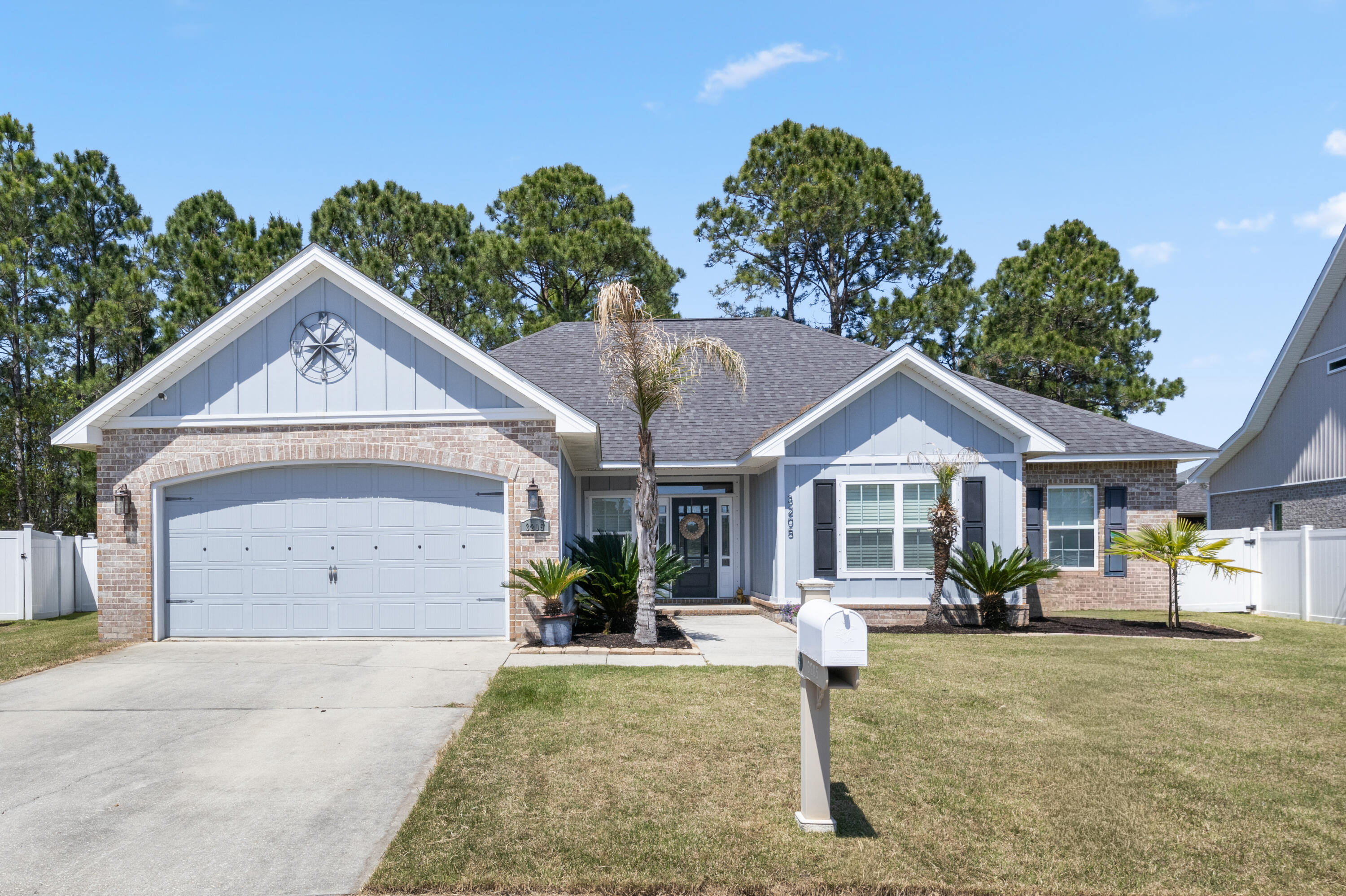 Tucked inside the sought after gated waterfront community of Windward Cove, this well maintained single story home offers a functional layout, thoughtful updates, and a quiet setting with pond and nature views.
This 4 bedroom, 2 bathroom home features a split floor plan and open main living area with high ceilings, a gas fireplace, and direct access to the back porch.
The kitchen is set up for everyday use with granite countertops, stainless steel appliances, a large island with seating, pantry, and a window overlooking the backyard. The dining area sits just off the kitchen, creating an easy flow between spaces.
The primary suite is tucked away for privacy and includes trey ceilings, natural light, and an ensuite bath with double vanities, a garden tub, separate shower and a walk in closet.
Tile flooring has been installed throughout the main areas and most bedrooms, with carpet in one guest room, adding both durability and comfort.
Out back, you'll find a covered porch that extends to an additional deck, creating multiple spaces to relax, grill, or enjoy the peaceful setting with no direct rear neighbors. Both the front and back ponds are fishable, adding to the outdoor experience right from your own home.
Windward Cove offers private access to Perdido Bay with a community beach, pool with bath house, sidewalks throughout, and a private marina with potential boat slip ownership.
Conveniently located near Perdido Key beaches, shopping, and dining, with easy access to Naval Air Station Pensacola, downtown Pensacola, and Orange Beach.