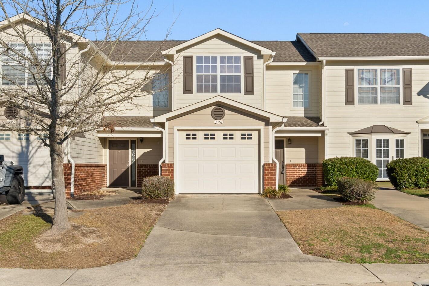 This well maintained 2 bedroom, 2.5 bath townhouse is conveniently located in South Crestview with an easy commute to shopping, dining and area military bases. The semi open floor plan keeps the main living area connected to the dining space and kitchen, creating a comfortable and functional setting whether you are winding down after a long day or hosting friends. Upstairs, both bedrooms feature private en suite bathrooms, giving everyone their own space and added privacy. With lawn care included, your weekends stay yours with simple, low maintenance living, and the community pool and playground offer an easy way to relax close to home. New roof and water heater installed in 2025. Schedule your showing today.