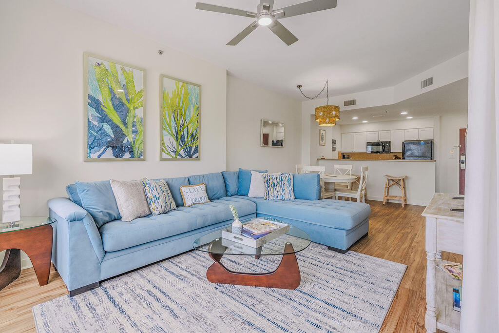 Located on the south side of Sandestin Golf and Beach resort, Luau 6328 has been recently been updated and boasts an exceptional rental history!  If you're looking for your next income producing rental, look no further with proven gross rental income of $60,000! Unit 6328 is completely turn-key, and rental ready, -offered fully furnished and decorated, to include an in-unit washer and dryer, new coastal inspired furnishings, linens along with kitchen and beach essentials. This 1 bedroom, 1 bathroom condo exudes coastal charm with the new furnishings, and decor. Luau 6328 also offers beautiful sunset facing views of the resort, lagoon pool, and peek a boo views of the Gulf from your living room and private balcony. Luxury vinyl plank flooring throughout the condo gives you a touch of sophistication as well as easy maintenance. The open living area seamlessly flows into the fully-equipped kitchen which offers a breakfast bar, freshly painted cabinets and ample counter space. Luau also has garage parking and owners storage closets downstairs to store your beach essentials, secure your bike/s and or utilize for your storing needs. Relish in resort amenities: relax by the beautiful lagoon-style pool, utilize the Luau fitness center or take a short walk to enjoy the beach! Sandestin resort is surrounded by 4 golf courses for those avid golfers, tennis and pickle ball courts on the north end of the resort, Sandestin marina is also on the north end of the resort to enjoy boating or water sports. At the heart of Sandestin Golf and Beach Resort is  where you can revel in the fun and events at The Village of Baytowne. Dine in one of the restaurants or have some drinks at one of the bars and or take the kids to the playground, arcade, or walk around the Village to partake in the weekly events: movie nights, live bands, weekly fireworks and magic shows along with seasonal events for the holidays. This is resort living at its finest, this is more than place, it is a lifestyle -perfect for making unforgettable beachside memories.