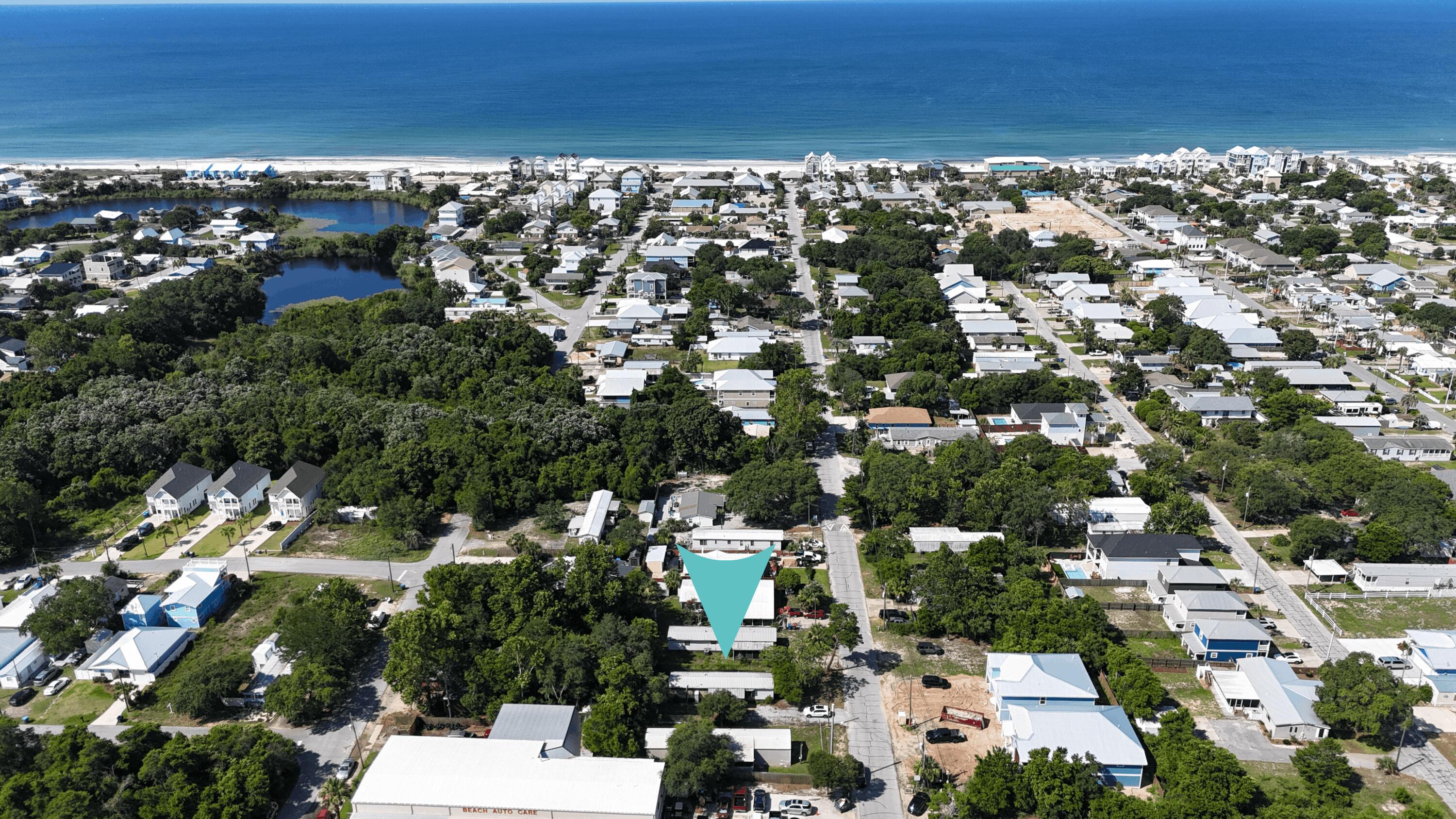 Discover the possibilities at v322 14th St on the highly desirable west end of PCB. Situated on an oversized homesite just blocks away from the beach, this property offers an exceptional opportunity for investors, builders, or buyers looking to create their ideal beach retreat. 
A partially remodeled mobile home currently sits on the property that could be tenant occupied, providing immediate rental income potential while you design and plan your future build.  Whether you are looking to renovate, rent, or construct a new home, the generous lot size offers outstanding flexibility and development potential. Enjoy a prime location near beach, Pier Park, Lake Powell, shopping, entertainment. With it's desirable west end location, oversized lot, and existing income-producing structure, this property presents a unique opportunity to enjoy immediate value while planning for the future. Don't miss your chance to own a property with endless possibilities in PCB's  most sought after areas