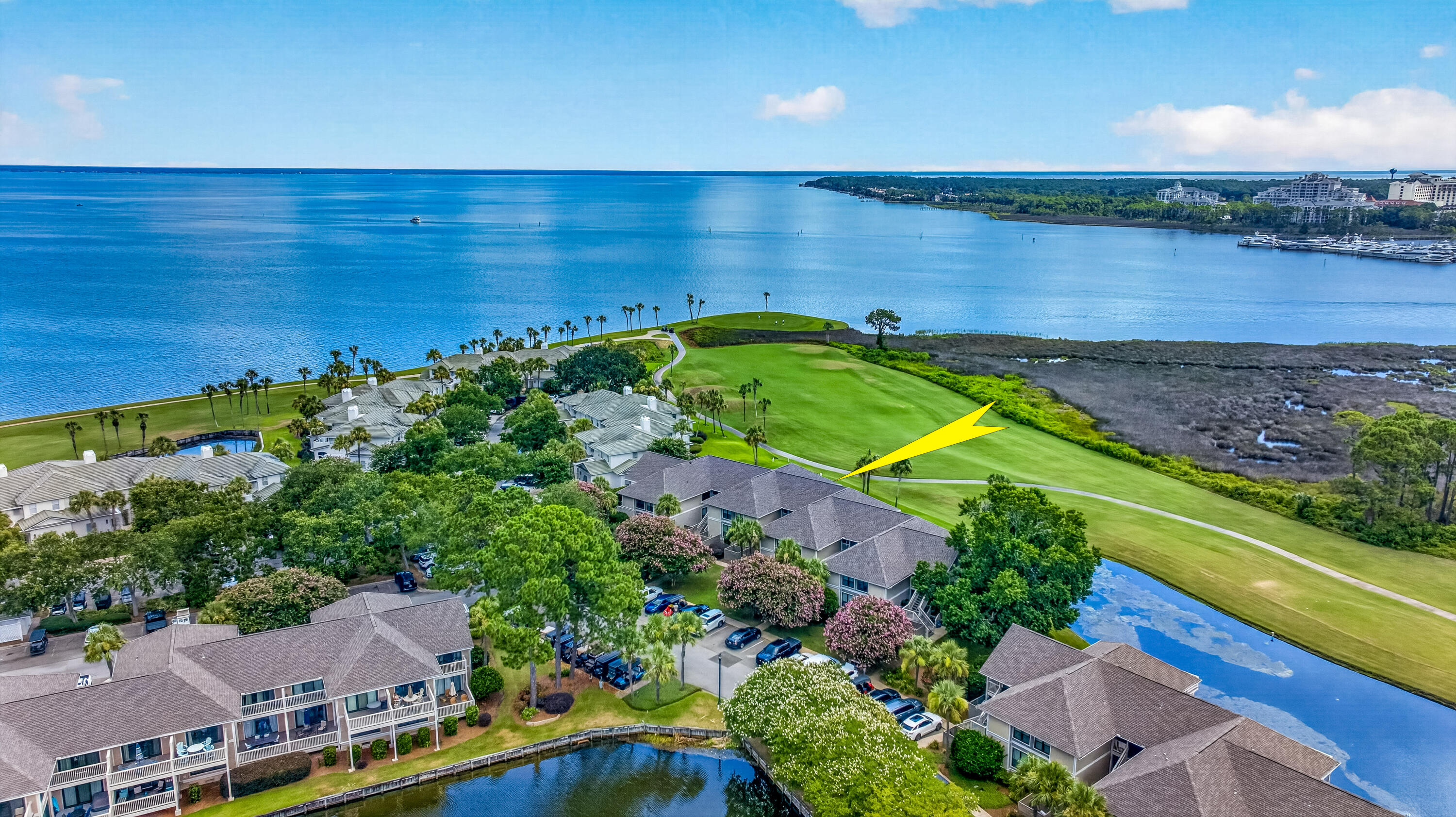FURNISHED! GOLF CART INCLUDED! BAY, MARINA & GOLF COURSE VIEWS!Discover 824 Harbour Point Drive, a furnished, cosmetically enhanced 2-bedroom, 2-bath bay-view condominium located on the second level within the gated Sandestin® Golf & Beach Resort in Miramar Beach, Florida. This turnkey coastal retreat showcases breathtaking Choctawhatchee Bay, marina, and golf course views from two expansive private balconies, creating the perfect setting for sunrises, sunsets, and effortless Emerald Coast living. The open-concept floor plan features abundant natural light, tasteful updates, stylish furnishings, and numerous improvements, including but not limited to 2025 updates such as new windows, exterior doors, attic insulation, a completely new HVAC duct system, HALO air purifier, and additional cosmetic enhancements. Ideal as a primary residence, second home, or short-term rental investment. Located in desirable Harbour Point, this residence overlooks the 14th hole of The Links Golf Course, one of four championship golf courses within Sandestin. Harbour Point is one of the few resort communities with its own private community pool. A golf cart is included, along with access to a community golf cart parking area, making it easy to enjoy a scenic ride or leisurely walk to the sugar-white sand beaches and emerald waters of the Gulf. Enjoy Sandestin resort amenities including golf, tennis, pickleball, boating, paddleboarding, kayaking, fishing, water sports, a full-service marina.... resort amenities including golf, tennis, pickleball, boating, paddleboarding, kayaking, fishing, water sports, a full-service marina, resort pools, trails, Baytowne Wharf, waterfront dining, shopping, entertainment, festivals, and year-round events. Centrally located near Scenic Highway 30A, Destin, Santa Rosa Beach, Freeport, Niceville, Fort Walton Beach, Panama City Beach, Eglin Air Force Base, Topsail Hill Preserve State Park, Grayton Beach State Park, and Point Washington State Forest. A rare opportunity to own a furnished, turnkey bay-view condominium in one of Walton County's most desired Northwest Florida resort communities. Interior photographs will be available by July 25, 2026. Listing Agent has an ownership interest in the subject property. Property is being sold furnished; select exclusions apply. Buyers shall verify any and all information.