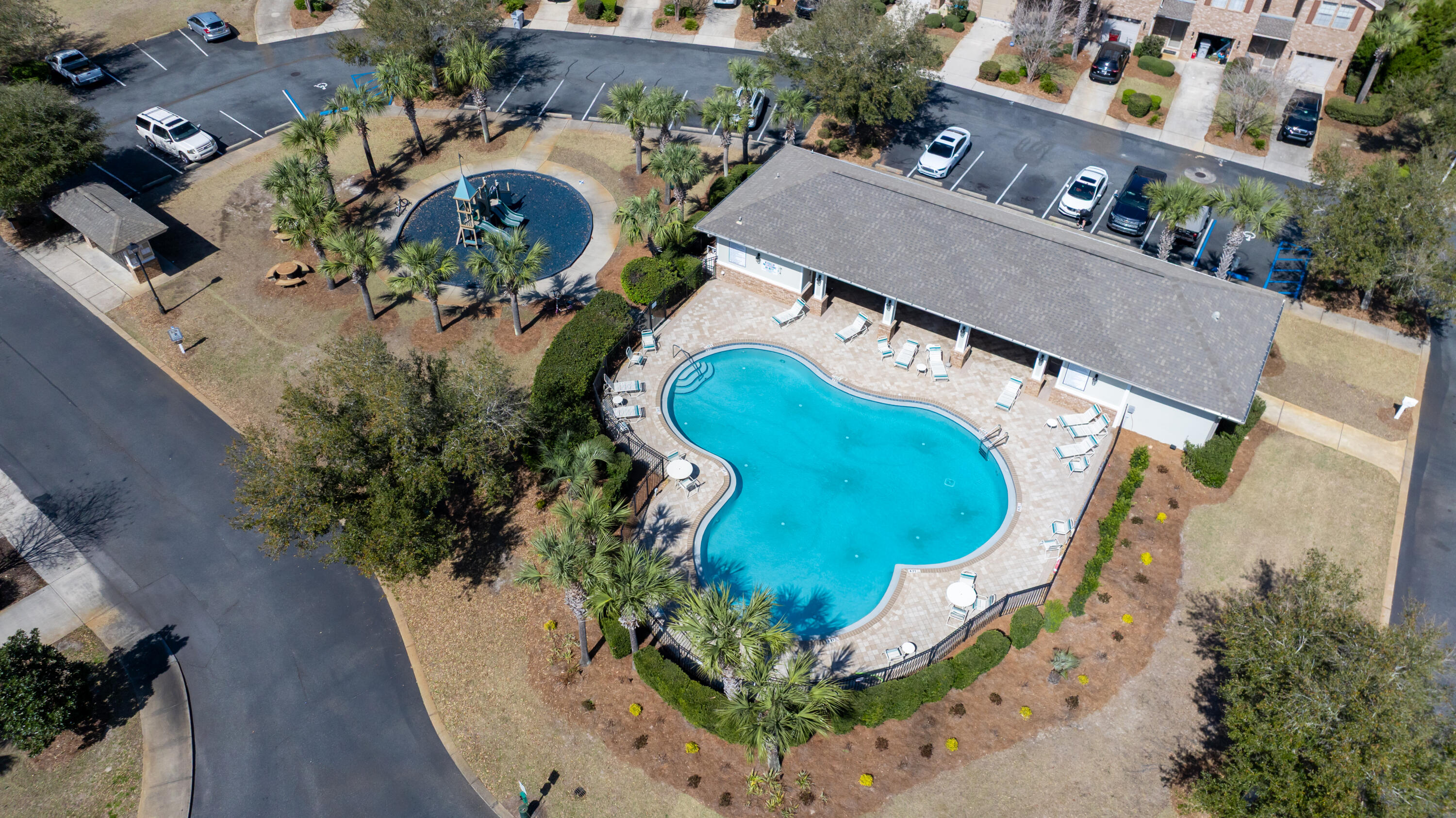 *Presented with staging furniture* Welcome to 8808 Brown Pelican Circle in Navarre, Florida, a beautifully maintained townhome located in the highly sought-after Reserve Pointe community. Perfectly positioned just 4 miles from the white sands of Navarre Beach, approximately 13 miles to Hurlburt Field, and about 36 miles to Pensacola Beach, this home offers the ideal blend of convenience and coastal living.
Reserve Pointe is known for its lifestyle-focused amenities, including a resort-style swimming pool, playground, and professionally maintained landscaping, creating a welcoming environment for residents and guests alike.

Inside, you'll find durable wood-look vinyl flooring throughout the main level, combining style and functionality. The kitchen is thoughtfully designed with stainless s teel appliances, granite countertops, a modern backsplash, and rich cabinetry, offering both elegance and everyday practicality. The open-concept layout provides a bright and inviting living and dining space, perfect for entertaining or relaxing at home. A convenient half bath is also located on the first floor.

Upstairs, the spacious primary suite serves as a private retreat, featuring an en-suite bathroom with double vanities, granite countertops, and a walk-in shower. Two additional bedrooms are serviced by a second full bathroom with a shower/tub combination, offering flexibility for guests, family, or a home office setup.

Step outside to enjoy a fully fenced backyard accented by a tropical palm tree, creating a private and relaxing outdoor space.