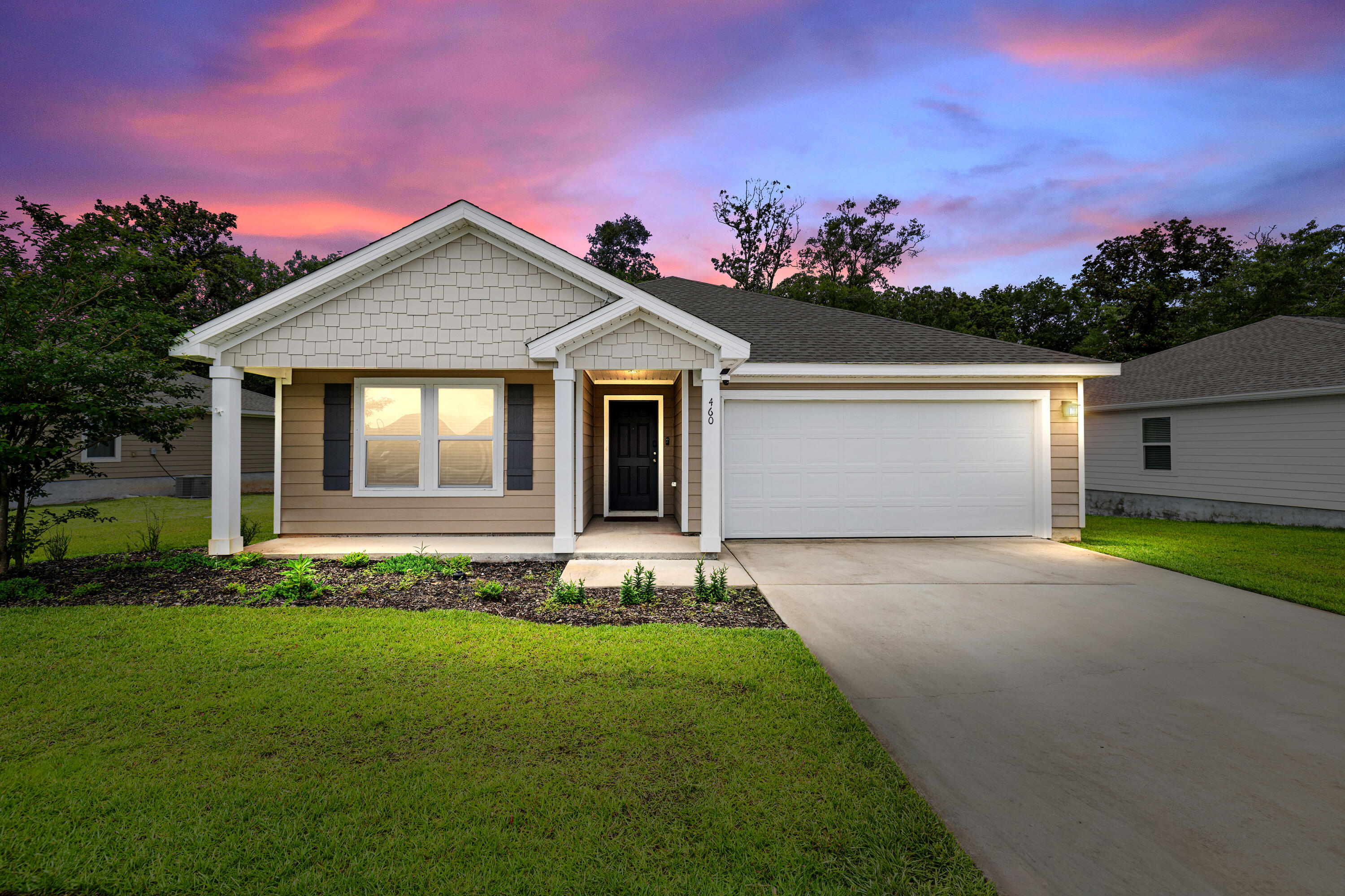 Florida is calling with community bay access, a large community pool, and nature trails right at your back door, located in the desirable RiverWalk Community in Freeport. This single-story residence offers four bedrooms, two bathrooms, and a two-car garage, combining modern finishes with comfortable everyday living.
Inside, you'll find an open-concept layout connecting the kitchen, dining, and living areas, creating a bright and inviting space perfect for entertaining. The kitchen features granite countertops, stainless steel appliances, ample cabinet space, and an LG refrigerator that conveys with the home.
The spacious primary suite includes a walk-in closet and an en-suite bathroom with a double vanity, oversized shower, and additional storage. Luxury vinyl plank flooring runs throughout the main living areas, while the bedrooms are comfortably carpeted.
Step outside to a covered back patio overlooking peaceful wooded views, offering both privacy and a relaxing outdoor setting. The home also includes numerous upgrades and smart-home features, including an LG washer and dryer, smart light and fan switches, smart doorbell and door lock, exterior security cameras, TV wall mounts, patio TV, LED color-changing eave lighting, hurricane storm panels, and a lawn sprinkler system with a yard pump.
RiverWalk residents enjoy access to a community waterfront dock and convenient proximity to shopping, dining, and the white-sand beaches of 30A.