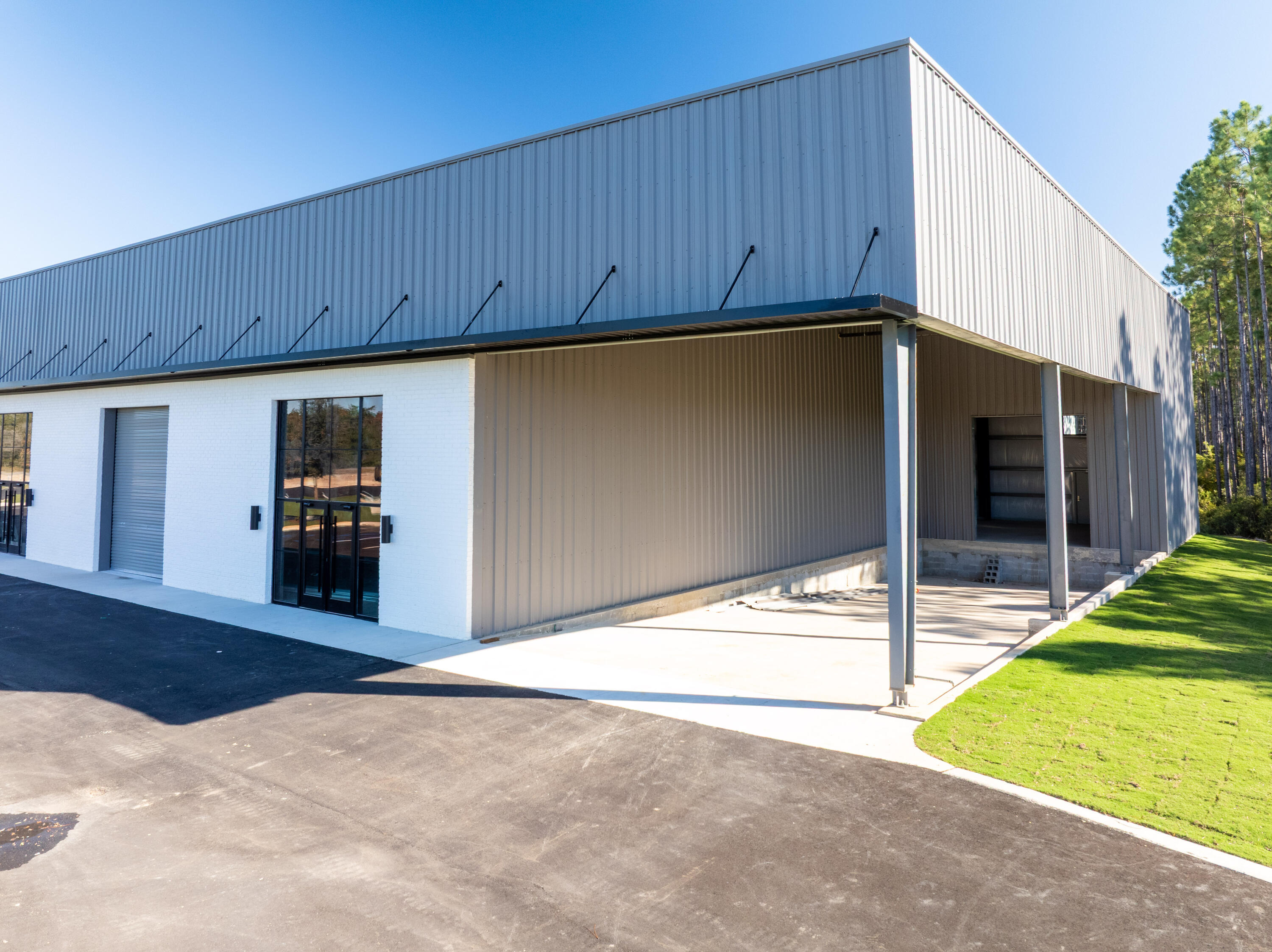 15,300 square foot freestanding building in St. Joe's South Walton Commerce Park of the flourishing Santa Rosa Beach, Florida market. This new building, known as 'Building B', faces Serenoa Road with exceptional visibility and ingress and egress and an abundance of storefront glass for excellent natural illumination, also offering a loading ramp and a large roll-up door for convenient logistics and receiving. St. Joe's Watersound Origins and 'Bay-Walton Sector Plan' involves 20,000+ rooftops of residential density in proximity to this new warehouse and flex space. The overall site plan is uploaded to this listing. Please inquire for further details.
