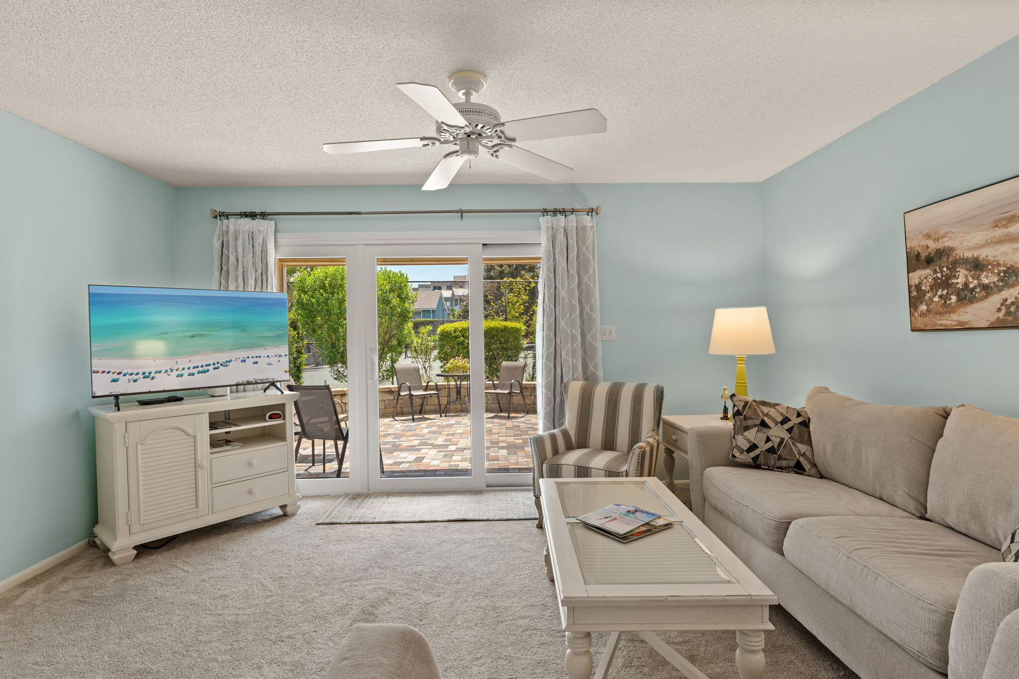 Nearly $1M in capital improvements completed at Chateau La Mer II--offering added value with no special assessments currently due. Private deeded beach access and rental projection over $40,000. This furnished 2-bedroom, 2-bath ground-floor condo presents an exceptional opportunity for a primary residence, second home, or investment property with strong income potential.

Inside, the spacious layout offers nearly 1,100 square feet with a well-designed kitchen, breakfast bar, and open dining and living area. The primary bedroom features a private en-suite bath, while the guest bedroom is generously sized and currently configured with two queen beds to accommodate additional guests. The extended patio provides a comfortable outdoor space for relaxing or entertaining just moments from the beach access.

Recent interior updates include:
April 2025 - new screen door, washing machine, dishwasher, and 55" smart TV
February 2026 - new sliding glass door to patio

Community and building improvements include:
2022 - new roofing and gutters
2023 - new irrigation system
2024 - pool resurfaced
2025 - new windows, railings, and stairs brought up to code
2026 - new siding and exterior paint
2026 - tennis court resurfacing scheduled

HOA fees cover the exterior property insurance, all utilities including cable and internet (excludes electricity - approximately $58 per month).

Ideally located with convenient access to nearby dining including Capt. Dave's, Kenny D's, Pompano Joe's, Sandos, and The Crab Trap. Just 2.7 miles to Publix, 3.5 miles to Mid-Bay Bridge, 3.5 miles to Silver Sands Premium Outlets, and 7.6 miles to Destin Harbor Boardwalk.

With extensive upgrades already completed, this turnkey property allows the next owner to step in and immediately enjoy the benefits of recent improvements along with strong rental potential.