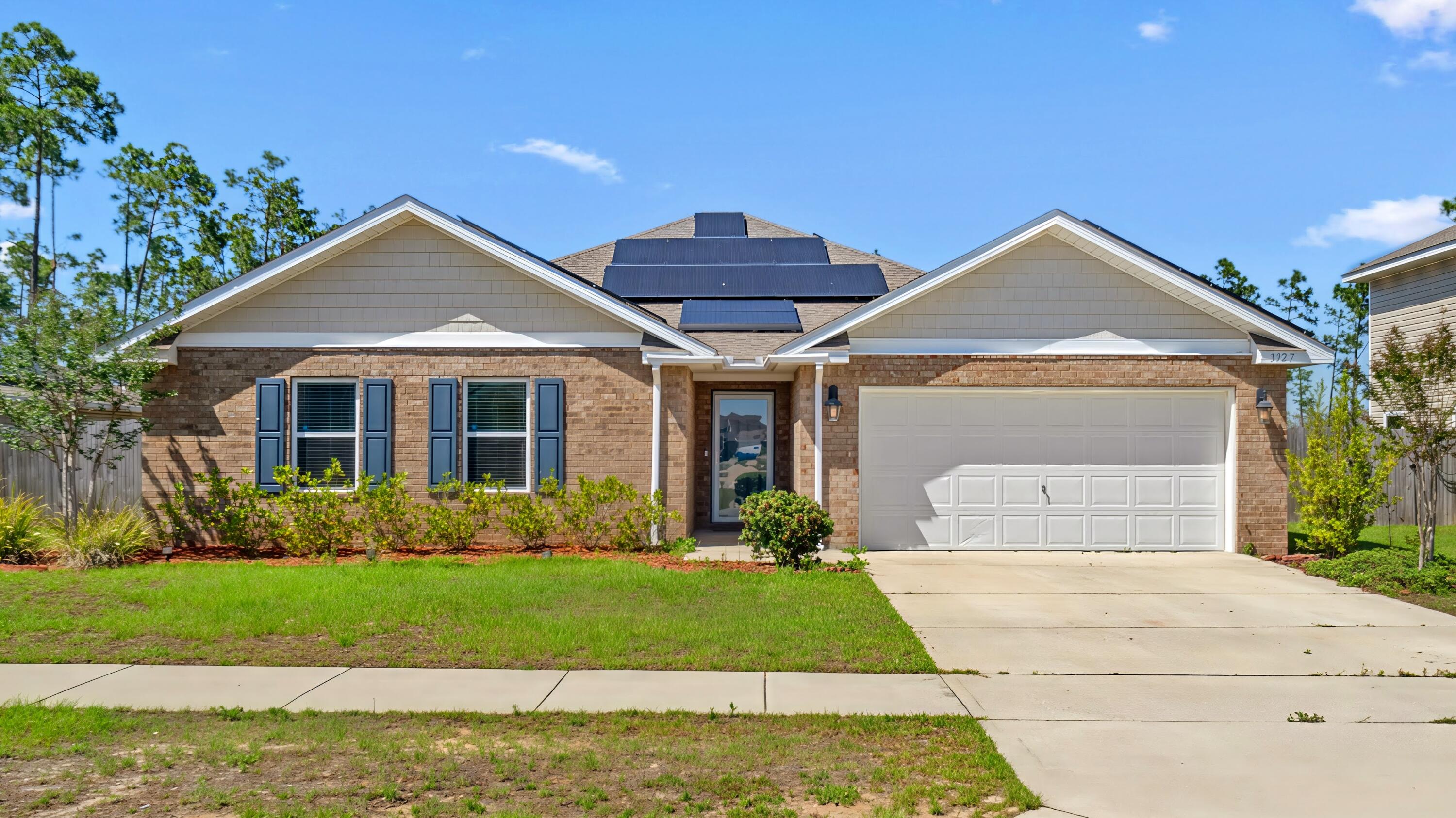 Assumable 2.375% VA loan! Welcome to a beautifully maintained 4-bedroom, 2-bath home in the desirable Magnolia Hills community. This floor plan perfectly balances comfort and functionality with an open-concept layout and a separate primary wing. The spacious kitchen is the heart of the home, complete with a large island, ample cabinetry, and seamless flow into the living and dining areas - ideal for both entertaining and everyday living. The private primary suite offers a relaxing retreat, while three additional bedrooms provide excellent flexibility for guests, a home office, or dedicated hobby space. Step outside to enjoy the screened-in back porch overlooking the fully fenced backyard, perfect for pets, outdoor recreation, gardening, or gatherings. Additional highlights include solar panels (fully paid off) for improved energy efficiency, a 2-car garage, extra driveway parking, and a storage shed. Conveniently located near Tyndall Air Force Base, shopping, dining, and local beaches, this move-in-ready home combines modern comfort with everyday practicality. Don't miss your opportunity to make this Panama City property yours!