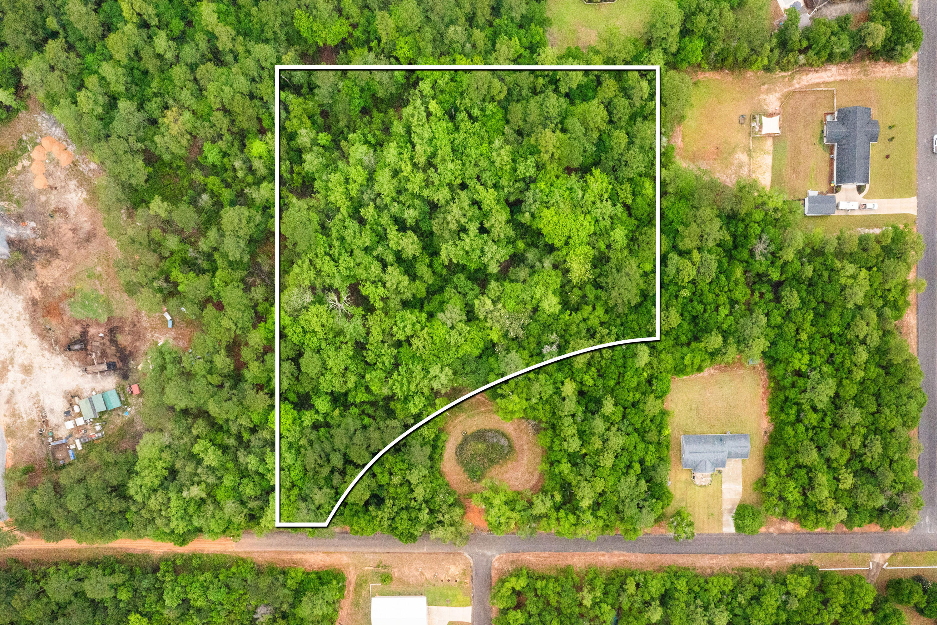 Just under 4 acres lot located in central Crestview. Perfect location for your next home site. Existing homes in the area allow for a community feel without compromising the secluded feel of the 4 acres.