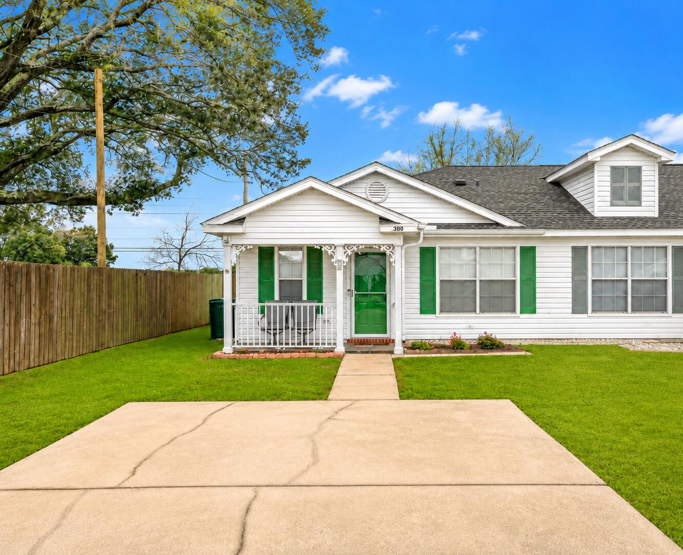 Welcome to this fully furnished, single-story end-unit townhome in Pensacola's Springfield subdivision. This 2-bedroom, 1-bath home offers 864 square feet of efficiently designed living space on a cul-de-sac in the 32526 ZIP code. A covered front porch opens to a living and dining area with crown molding, ceiling fans, central heating and air, and easy-care vinyl flooring. The kitchen features a pantry, built-in microwave, dishwasher, and refrigerator. Both bedrooms offer comfortable living space, while the centrally located bathroom is easily accessible throughout the home. Interior washer and dryer hookups add everyday convenience. Outside, enjoy a covered patio, partially privacy-fenced yard, and driveway parking. Offered fully furnished, this low-maintenance Pensacola townhome provides convenient access to Blue Angel Parkway, shopping, dining, medical services, major commuter routes, and area military installations. Schedule your private showing today.