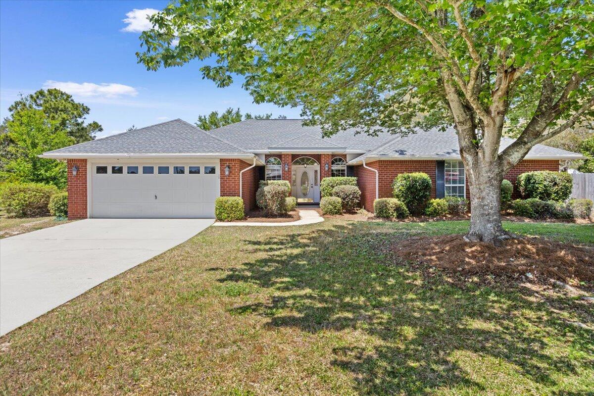 Great opportunity in Berkeley Forest subdivision in Gulf Breeze!  Spacious 4-bedroom, 2-bath home with a separate office offering 2,728 sq ft. This bright home showcases vaulted ceilings, beautiful wood floors, and a 27x19 great room ideal for gathering and entertaining.

The home includes a generously sized kitchen with ample cabinet space and room to make it your own, complemented by separate dining and living areas for added functionality. The layout features well-sized bedrooms plus a dedicated office, providing flexibility for work or additional living space. New roof in 2020.

Situated on one of the largest lots in the neighborhood, the backyard offers endless potential--room for a pool, outdoor entertaining and more.