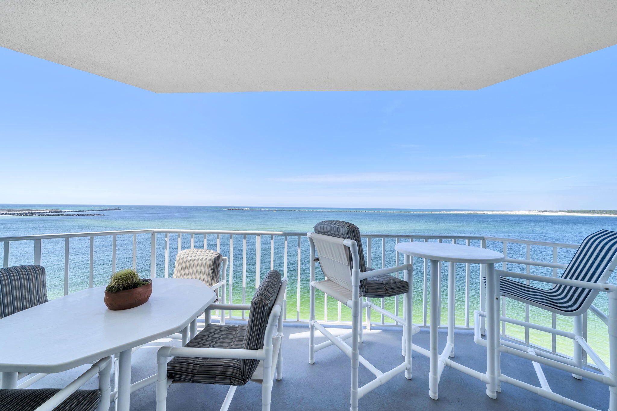 Located on the 5th floor of Waterview Towers Yacht Club, this condominium is an amazing waterfront prize. It is in prime location in Destin on Holiday Isle. It offers a panoramic view of the East Pass, Jetties, and the Gulf of Mexico, where you watch the dolphins play in the waves and boats drive by. The spectacle of Thursday night fireworks unfolds right before your eyes. Walking in the door it opens into a large open floor plan made up of the living room, dining area, and kitchen. The living room has plenty of comfortable plush seating to enjoy the stunning view of the emerald, green Destin water. The floor to ceiling sliding glass doors open to a large balcony with raised seating so you can enjoy a cup of coffee and the view. Near the living room is the dining area. The kitchen is just steps away and has all full-sized appliances and washer/dryer. The spacious granite counter tops allow you to have plenty of space to whip up a feast for 6 or a quick bite before heading to the complex pool. The first guest bedroom has 2 Twin sized beds, a ceiling fan, and flat screen TV. The guest bathroom offers a combination tub/shower. The second guest bedroom is like the Master Bedroom. It offers a King-sized bed, ceiling fan, and a view. The private guest bathroom is adjacent to the room. The Master Bedroom offers a King-sized bed, a ceiling fan, and fantastic view. The adjoining Master Bathroom has a large double sink vanity, a tub, and separate shower. The beach is access downstairs via a private gate, but the walk takes you to the public beach access point. The complex pool and hot tub are available downstairs for your use. This unit does come with Garage Unit#3 and Storage Unit #3.
