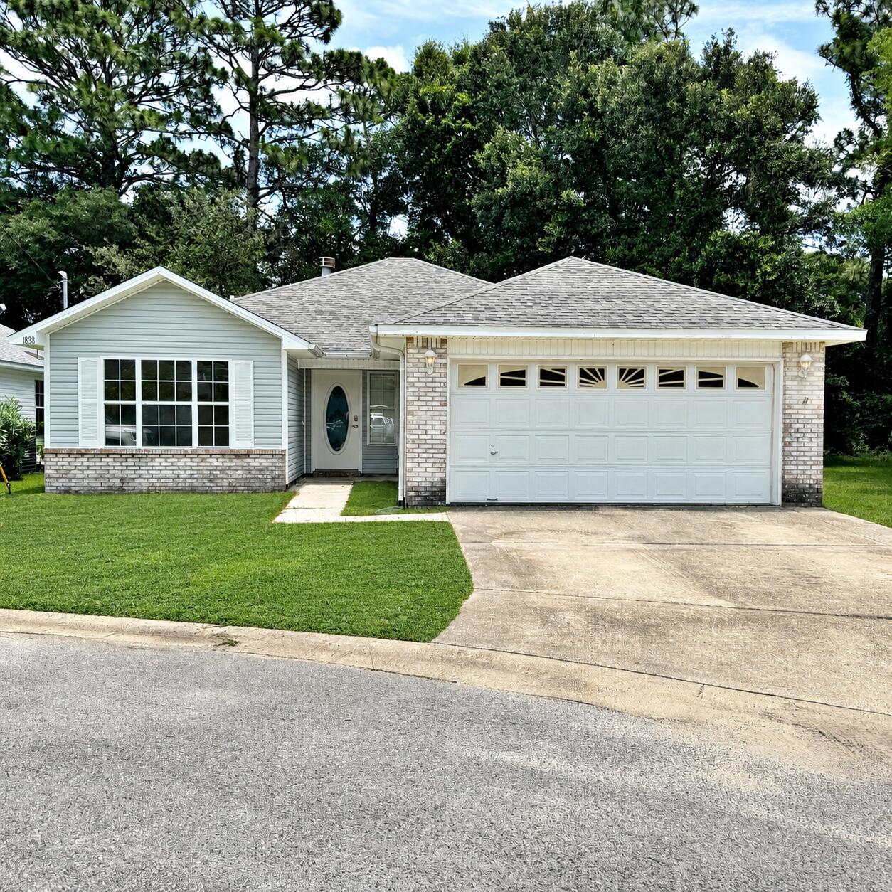 Extensively updated throughout--A Must See! WELCOME to this move-in ready Fort Walton Beach home, conveniently located near major employment centers, shopping, dining, recreation, and area military installations. Step through the front door into an inviting entryway that opens to a spacious living room featuring a cozy fireplace for relaxing evenings. LVP flooring extends throughout the main living areas, and all three bedrooms creating a clean and durable finish. The kitchen showcases beautiful granite countertops, white cabinetry, abundant natural light, and an open layout that flows seamlessly into both the dining area and living room--ideal for everyday living and entertainment. The primary bedroom offers generous space, an updated en-suite bath, and a sizable closet. Two additional bedrooms provide flexible space for a variety of needs and share a second full bathroom. The owner invested more than $20,000 in updates: recent interior paint adds a fresh touch throughout the home, LVP flooring throughout, ceiling fans, new microwave, new vanity, interior doors refurbishment, LED lighting, and much much more. Lastly, as an added convenience, the garage is now heated and cooled, adding an addition 400 sq ft for optional use. The new roof was install in November 2018. Move-in ready and waiting for its next owner!