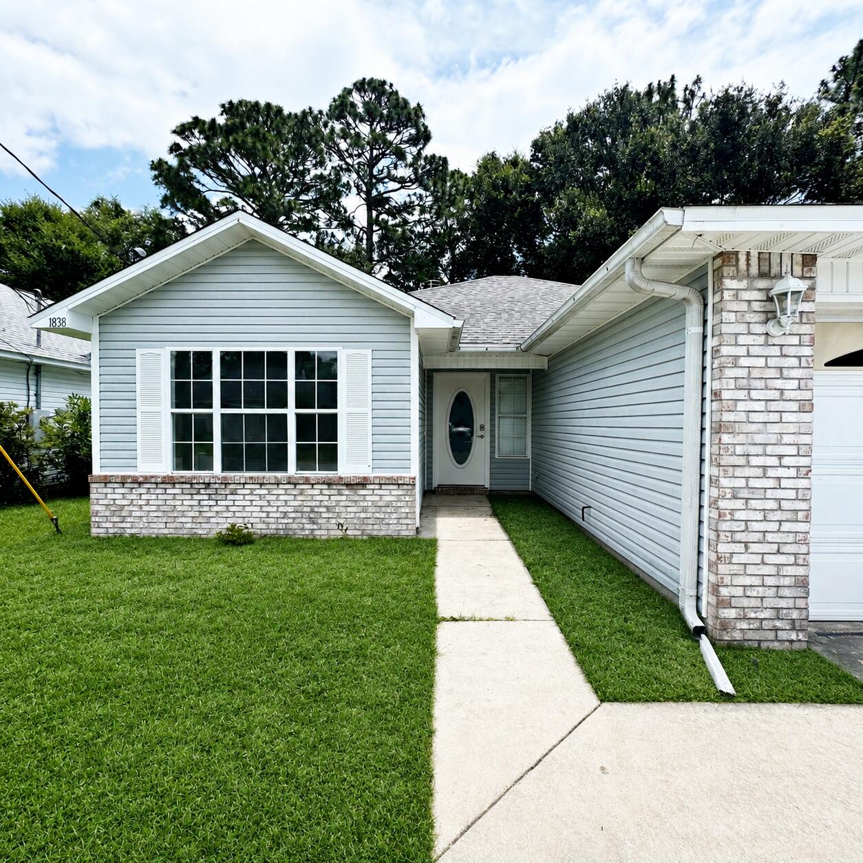 Extensively updated throughout--A Must See! WELCOME to this move-in ready Fort Walton Beach home, conveniently located near major employment centers, shopping, dining, recreation, and area military installations. Step through the front door into an inviting entryway that opens to a spacious living room featuring a cozy fireplace for relaxing evenings. LVP flooring extends throughout the main living areas, and all three bedrooms creating a clean and durable finish. The kitchen showcases beautiful granite countertops, white cabinetry, abundant natural light, and an open layout that flows seamlessly into both the dining area and living room--ideal for everyday living and entertainment. The primary bedroom offers generous space, an updated en-suite bath, and a sizable closet. Two additional bedrooms provide flexible space for a variety of needs and share a second full bathroom. The owner invested more than $20,000 in updates: recent interior paint adds a fresh touch throughout the home, LVP flooring throughout, ceiling fans, new microwave, new vanity, interior doors refurbishment, LED lighting, and much much more. Lastly, as an added convenience, the garage is now heated and cooled, adding an addition 400 sq ft for optional use. The new roof was install in November 2018. Move-in ready and waiting for its next owner!