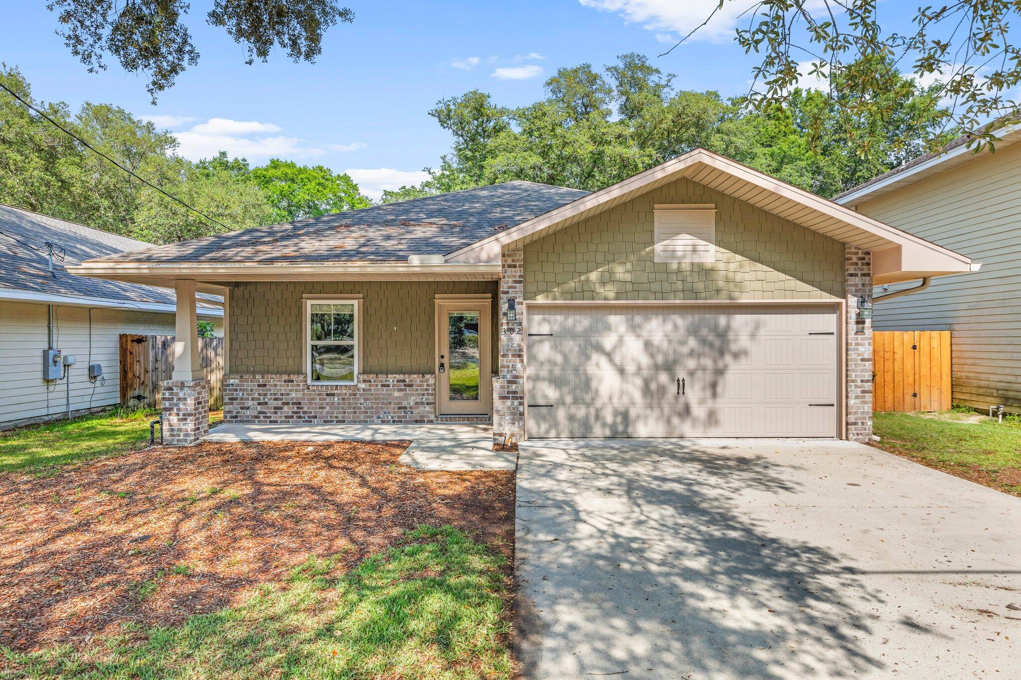 Welcome to this stunning 3-bedroom, 2-bathroom home in the heart of Niceville, offering the perfect blend of comfort, style, and convenience. Thoughtfully updated with high-end finishes throughout, this home feels like new and is ideally located near top-rated schools, including Ruckel Middle School, Niceville High School, and Edge Elementary, as well as EOD School, shopping, dining, and local military bases.

A charming covered front porch provides the perfect spot to enjoy your morning coffee, while the spacious two-car garage offers flexibility for parking, storage, or even a home gym setup.

Step inside to discover an inviting floor plan featuring hardwood and tile flooring throughout the main living areas, with plush carpeting in the bedrooms. The expansive great room boasts soaring vaulted ceilings and overlooks the beautifully landscaped backyard retreat.

The remodeled kitchen is a chef's dream, showcasing rich maple cabinetry with crown molding, granite countertops, stainless steel appliances, an oversized breakfast bar, and a large pantry for added storage.

The spacious primary suite offers direct access to the backyard oasis and features a large walk-in closet, dual vanities, and a relaxing jetted soaking tub. Outdoors, you'll enjoy a covered back porch and an additional cobblestone patio area, creating the perfect setting for entertaining or unwinding after a long day.

This exceptional home combines modern upgrades, spacious living, and an unbeatable Niceville  location. Schedule your showing today!