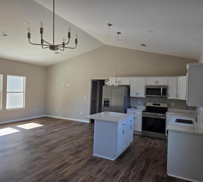 Preferred lender incentive available!
Qualified buyers may receive a lender credit toward a permanent interest rate buydown--helping make this beautiful new home even more affordable. Discover this spacious new construction home featuring a desirable split floor plan with 3 bedrooms and 2 bathrooms, offering a total 2,306 sq ft of comfortable living space. Nestled on a beautifully wooded 1.39-acre lot, this property provides the perfect balance of privacy and natural surroundings. Step inside to an open-concept layout filled with natural light, ideal for both everyday living and entertaining. The expansive kitchen offers plenty of space to gather and create lasting memories. The primary suite is a true retreat, complete with a walk-in closet and a luxurious ensuite bathroom featuring a stand-alone soaking tub and separate tile shower.
Enjoy peaceful outdoor living with a covered front porch and a 14' x 12' back deck, perfect for relaxing mornings or quiet evenings overlooking serene wooded views. Additional features include an attached garage with attic access, providing ample storage space. This area is experiencing exciting growth, with increasing job opportunities driven by major developments such as the Amazon Distribution Facility and the River Ranch Aerospace Manufacturing Project--both contributing to rising property values and long-term investment potential. Enjoy the peace of country living while remaining conveniently connected. This home is just a short drive to Crestview, Fort Walton Beach, and Destin, with easy access via Highway 90 and nearby interstate routes. Experience country living with modern comfort--don't miss this opportunity! All plans, features, and specifications are subject to change at the builder's discretion without prior notice, and may not be known to the listing agent at the time of change. Note: Photos may not reflect the new build specs. This is the same house plan, but builder will and or may make some changes during build