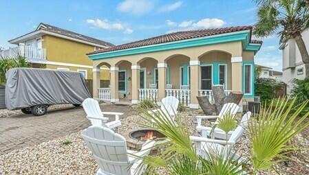 Gross Rental Income for 2025 was $65,297.42!  Great 3 bed/2 bath vacation rental in Terra Cotta Terrace.  Comes fully furnished along with a hot tub.  New HVAC unit has been installed.  Just a short walk to the gated, private beach access.  Inside you will find an open & bright floor plan with wood look tile flooring throughout and a spacious kitchen equipped with stainless appliances and a breakfast bar. The large back deck is where you will find the hot tub and out front is a firepit with Adirondack chairs and a large covered porch; plenty of options to relax after a day at the beach.  Amenities include a community pool, volleyball and tennis courts.  Conveniently located to great restaurants, shopping and fun activities for both kids and adults.