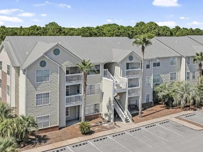 The perfect home or investment unit in the heart of Destin - Investor Ready - This 3 bedroom 2 bath lake view condo in the heart of Destin is located on the 2nd floor and will make for the perfect primary residence, second home, or investment property. Current tenants are also interested in continuing their lease. Indian Lake features a fitness center, a pool, and a playground. The complex is central to everything in Destin - 1.2 Miles to Henderson Beach or 3 miles to the beach access by The Back Porch Restaurant. Under 3 Miles to Destin Commons and 4 miles to the beautiful Destin Harbor with many great restaurants, attractions and water activities. The community is situated directly across the street from Morgan's Sports Center ... ...The community is situated directly across the street from Morgan's Sports Center - Destin's premier recreational complex featuring sporting fields, jogging tracks, sand volleyball courts, and a playground. The Destin Dog Park is right across the street as well. 

Showings are by appointment - 24 hour notice is preferred. No special assessment. Quarterly HOA Dues are $2160.83 or $720.28 per month and includes Amenities, Management fees, Trash and Basic TV.  Buyer to verify all information. Please review the Document section.