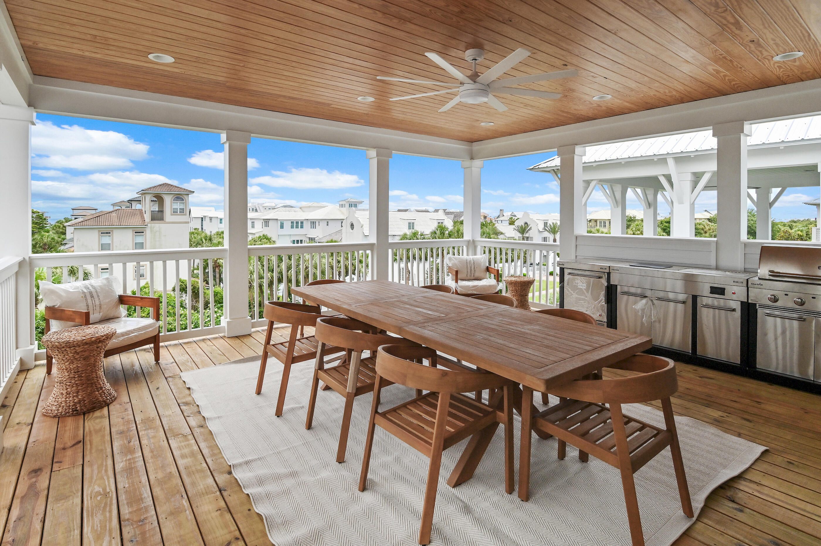 Situated in the highly desirable Seacrest Beach community along scenic 30A, this stunning new construction beach home offers the perfect blend of luxury and relaxed coastal living and comes fully furnished. The residence features five generously sized bedrooms and four and a half beautifully appointed bathrooms, highlighted by elegant 9-inch wide engineered wood plank flooring that flows throughout the home. Designed with both comfort and flexibility in mind, the layout includes two primary suites--one conveniently located on the first floor and another on the third--providing ideal accommodations for owners and guests. The home also features three separate living areas, giving everyone space to gather or unwind. The main living room on the first floor serves as the central hub and showcases a dramatic 72-inch three-dimensional electric fireplace, adding both warmth and a modern focal point.

On the second floor, you'll find another comfortable living area that opens to a covered porch, creating the perfect setting for relaxing or entertaining while enjoying the coastal breeze. The open-concept kitchen is designed to impress with stylish shaker cabinetry, quartz countertops, a beautiful tile backsplash, and premium appliances that will delight any home chef. Just off the kitchen, a thoughtfully designed wet bar with open wood shelving, a wine refrigerator, and an ice maker makes hosting effortless.

The third level offers yet another spacious living area along with a large porch featuring a summer kitchen and views overlooking Scenic 30A--an ideal spot for gathering with friends and family.

This home also incorporates modern efficiency and convenience, including a high-performance Rinnai 11.5 GPM tankless water heater that delivers continuous hot water, as well as a washer and dryer.

For effortless beach days, the Seacrest Beach community shuttle provides quick transportation to the Gulf.

Enjoy starting your mornings at a nearby café or exploring the exceptional dining, shopping, and entertainment found just a short distance away in Rosemary Beach and Alys Beach. Spend your days relaxing along the world-famous white sand beaches of 30A, casting a line along the coast, or playing a round at Camp Creek Golf Club. Outdoor enthusiasts will also love visiting Camp Helen State Park, where opportunities for birdwatching, hiking, kayaking, and fishing await along the tranquil shores of Lake Powell.