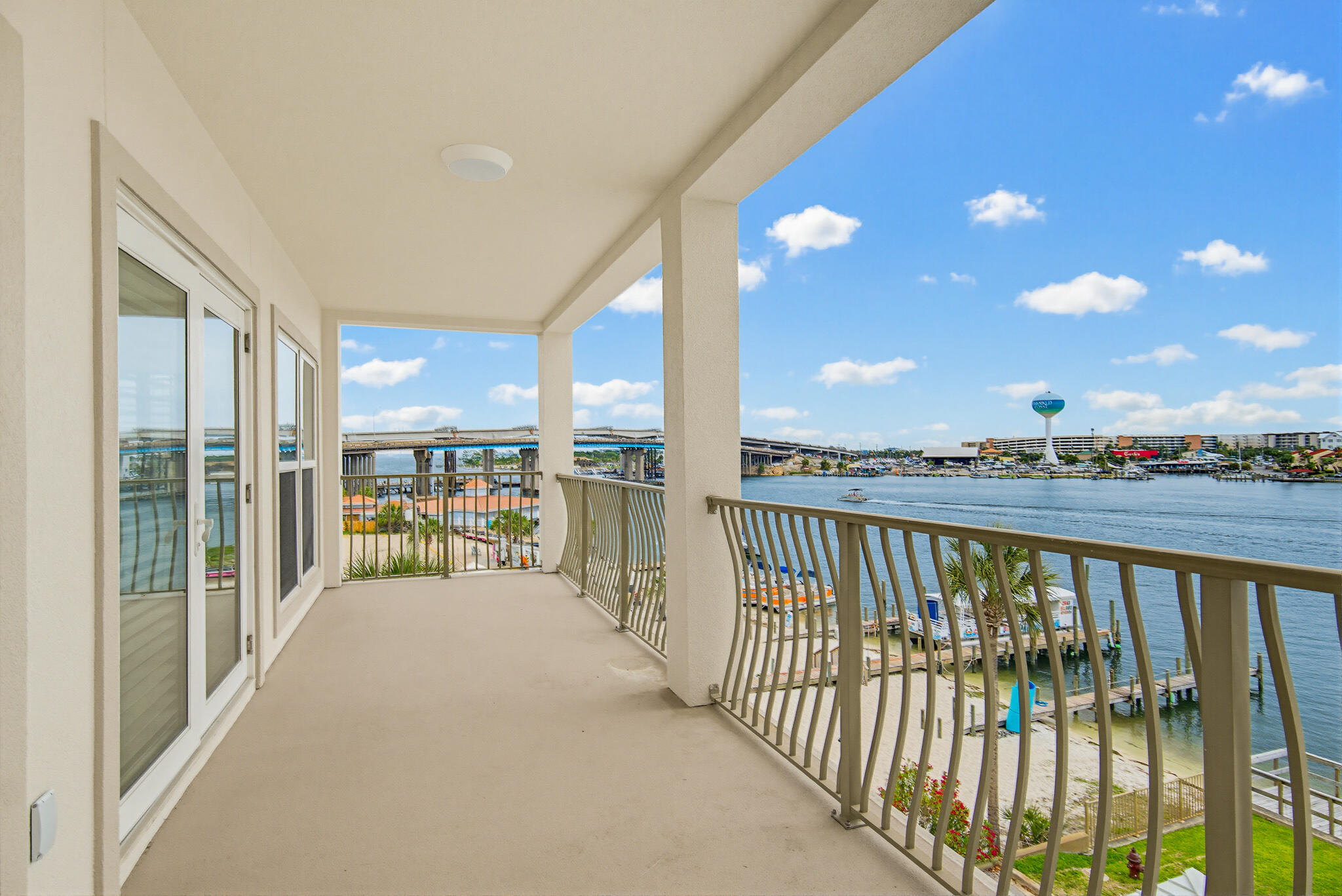 Under contract with a 72-hour kick out clause in place. Welcome to Sailwatch Landing - B401, 187 Brooks St SE, Fort Walton Beach

Discover true Southern living in this stunning 4th-floor end unit nestled within one of historic downtown Fort Walton Beach's most sought-after addresses. This beautifully appointed 3-bedroom, 3-bathroom luxury condo spans 1,740 square feet of sun-drenched living space, with windows on three sides flooding the interior with natural light from southern, eastern, and northern exposures.

From your covered balcony, let the views take your breath away. Watch barges glide along the Santa Rosa Sound, take in boating activities on the Intracoastal Waterway, and gaze all the way to Destin across gorgeous bay waters. From Billy Bowlegs festivities to spectacular fireworks displays, this balcony becomes your front-row seat to the best of Emerald Coast living.

Sailwatch Landing is a private, secure 29-unit complex offering a gated entrance, sparkling swimming pool, community day dock, and private docks available for purchase. Your unit includes a private enclosed oversized one-car garage and a convenient 5x7 storage unit.

The neighborhood puts everything within easy reach. Brooks Bridge Waterfront Park is just moments away, with the nearby Publix, charming local restaurants, and shops also close by. The beach is just over Brooks Bridge, making sandy toes an everyday affair.

Designed as a long-term rental-only community, this property presents an exceptional opportunity for steady rental income in one of Florida's most desirable coastal markets.

Don't let this rare gem slip away--schedule your private showing today!