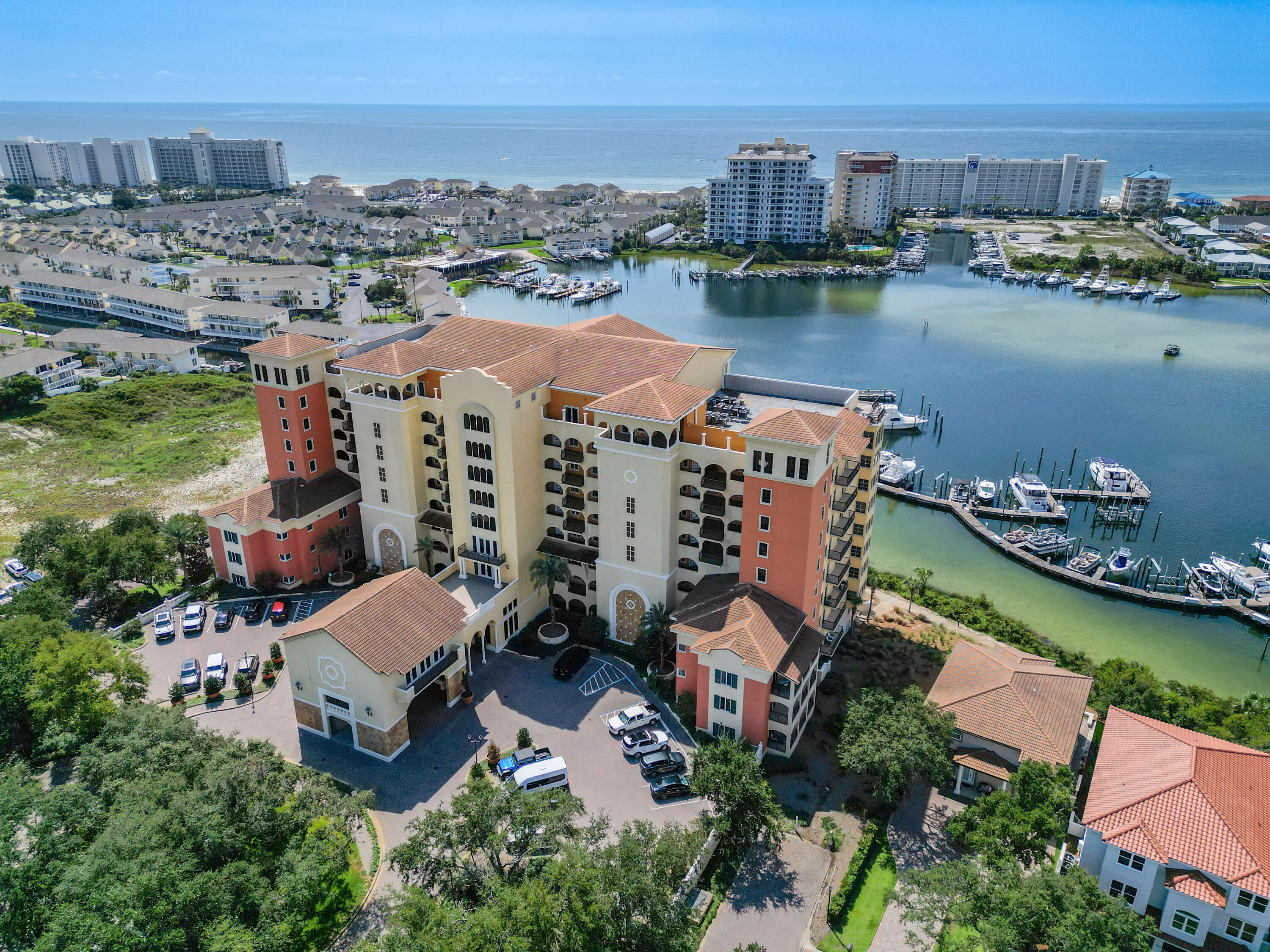 Rare opportunity to own a two-bedroom unit in the beautiful Marbella Condominiums, located directly on the Destin Harbor. Unit 2J is situated on the west end of the building and features a spacious, bright, and airy living space with tasteful decor. The large master bedroom includes an adjoining master bath and walk-in closet. Enjoy the private balcony with harbor view and a vibrant community lifestyle, including social events like ''game night'', ''wine-thirty'', and other planned festivities planned by the homeowners throughout the year. The unit conveys with two parking spaces (#241 and #254) both located on the P2 parking deck, and storage unit 209, which is conveniently located just outside the front door of the unit. Marbella is a non-short-term rental building, with most residents utilizing their units as primary or secondary homes. Marbella is in the heart of the Destin lifestyle, near boating, golfing, dining, grocers, shopping, and the white sandy beaches of Destin. Residents have access to the marina where one can become a member of Legacy Boat Club if desired. All dimensions and HOA fees are to be verified by the buyer.