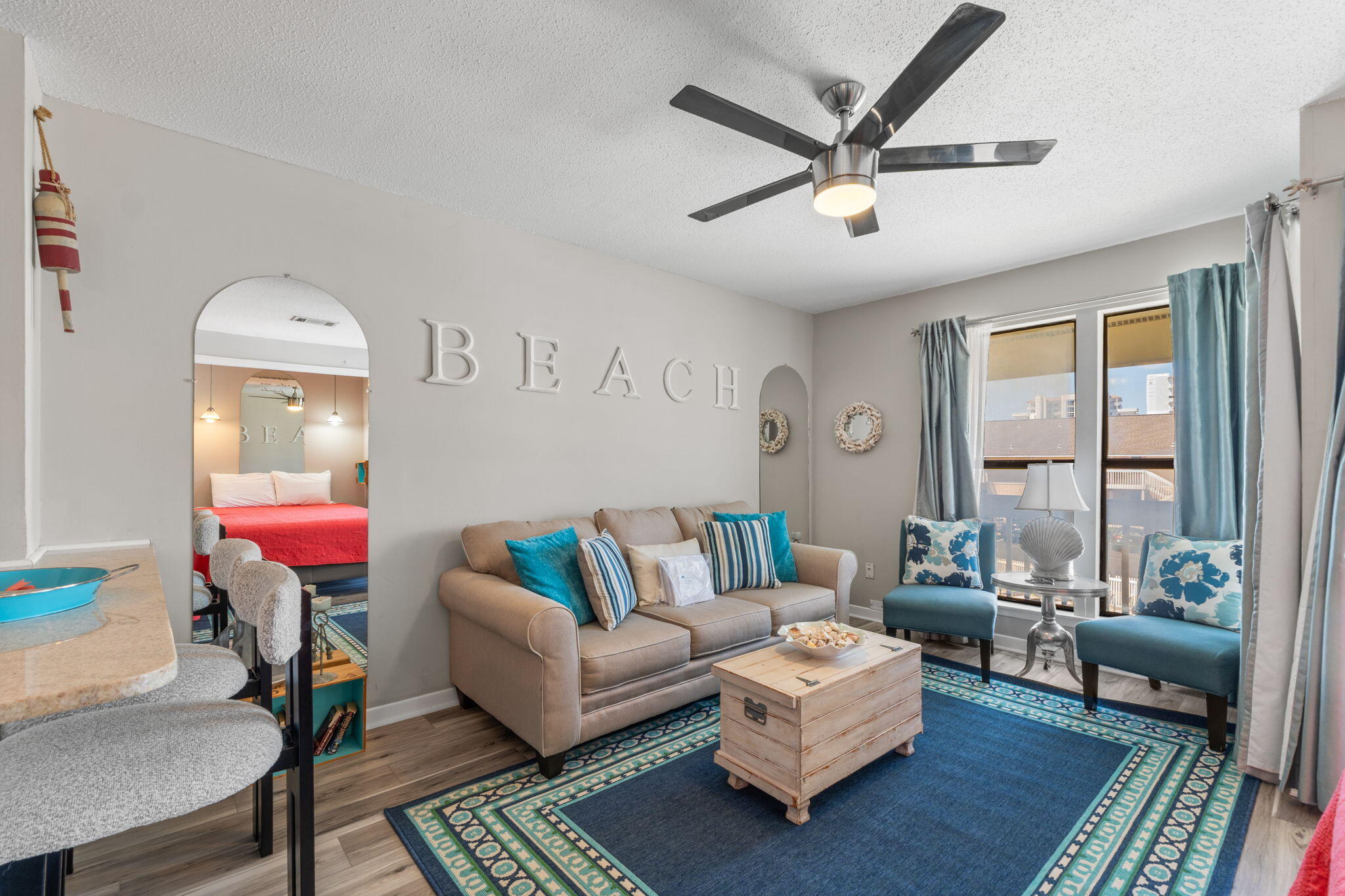 Welcome to Studio #8214, a newly updated beach getaway filled with coastal charm and a peek of the Gulf from your private balcony! This delightful second-floor condo offers a cozy yet stylish retreat with stainless-steel appliances, a full-size kitchen, breakfast bar, open floor plan, queen bed, and sleeper sofa for added flexibility. Enjoy a relaxing balcony view with a peek of the pool while soaking in the Sandpiper Cove atmosphere. Recent updates include new interior doors, electrical, and water heater improvements. Sold fully furnished and ready to enjoy as a vacation retreat, rental investment, or personal beach escape. The pool and laundry are just steps away for added convenience. Sandpiper Cove offers incredible amenities including deeded Gulf-front beach access, 5 pools, hot tubs, a 9-hole par-3 golf course, pickleball, tennis, marina access, and more.
