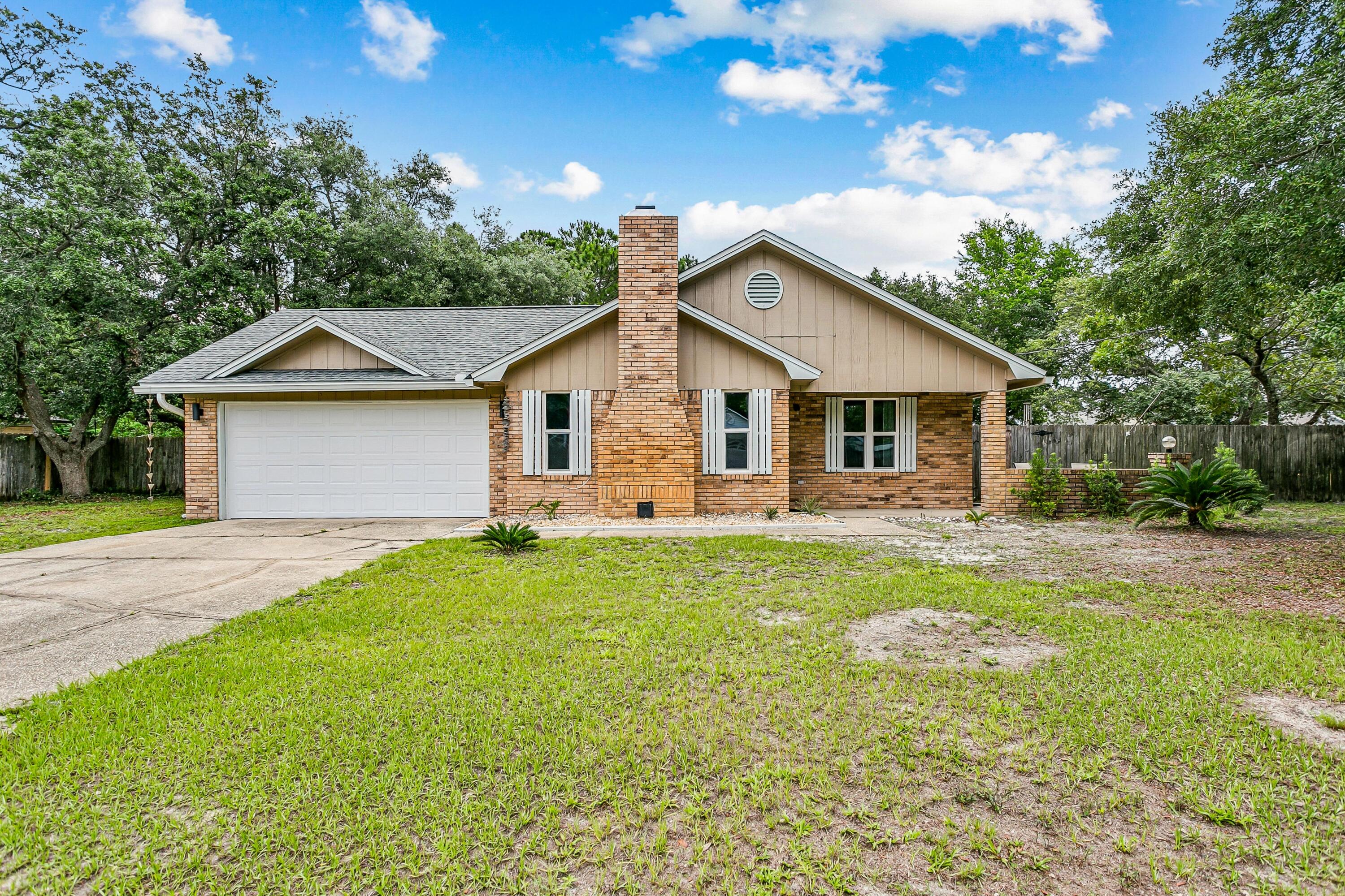 **Home Warranty provided through Guard Home Warranty with purchase**
Welcome home to 2182 Calle De Cantabria, a beautiful detached residential retreat nestled in the highly desirable Santillana neighborhood of Navarre, Florida. This home has been lovingly maintained by its owners and offers the ideal blend of coastal-fringe living and neighborhood charm. The private and spacious backyard is a blank canvas, just waiting for your outdoor living concept to come to fruition! Conveniently located just off Highway 98, this property is situated in an excellent school district, zoned for top-rated local schools and the ultimate Coastal Lifestyle. Enjoy everything the Navarre area has to offer, from pristine emerald-coast beaches to local dining and shopping just minutes away. Whether you are looking for your first home, looking to downsize, or seeking a fantastic investment opportunity in Santa Rosa County, this property is a must-see.