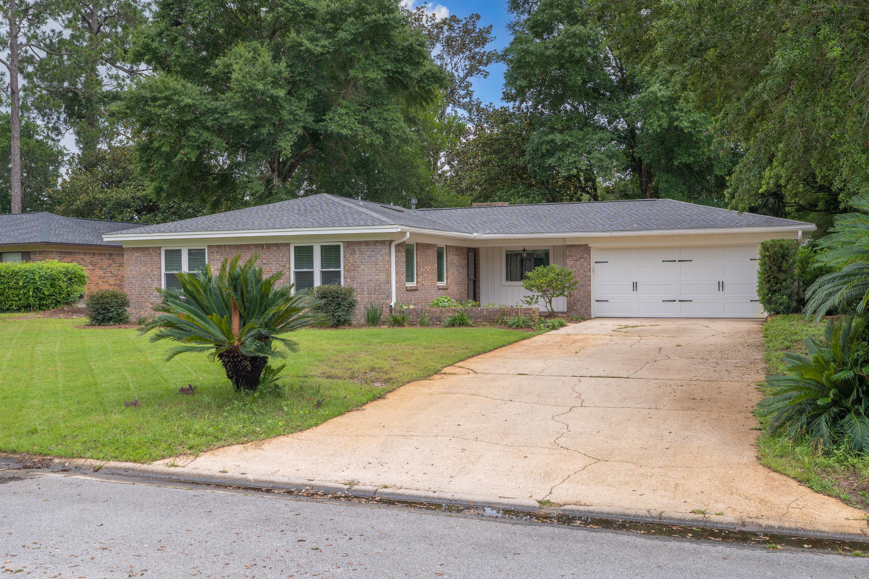 Welcome home to a newly renovated BEAUTIFUL FOUR bedroom two bath home with 2-car garage in Niceville! Thorough reno in 2023 including -  impact windows,  high end LVP wide plank flooring (no carpet), new flex/rec space (336 sqft), kitchen with shaker style cabinets, granite, SS appliances, baths, garage door and opener, popcorn ceiling removal,  lawn in front, elec panel and wiring, new lighting.  Opened up floor plan in the kitchen/family room. Very spacious and private back yard for entertaining too! 11/2022 roof. 2019 HVAC, 2019 Water heater.  Freshly painted exterior.  A must see in Niceville! EXCELLENT LOCATION.  Just down Palm Blvd from the middle school and high school.  Minutes from Eglin and Duke.  Easy access to shopping, entertainment, restaurants, state parks, and the beaches.