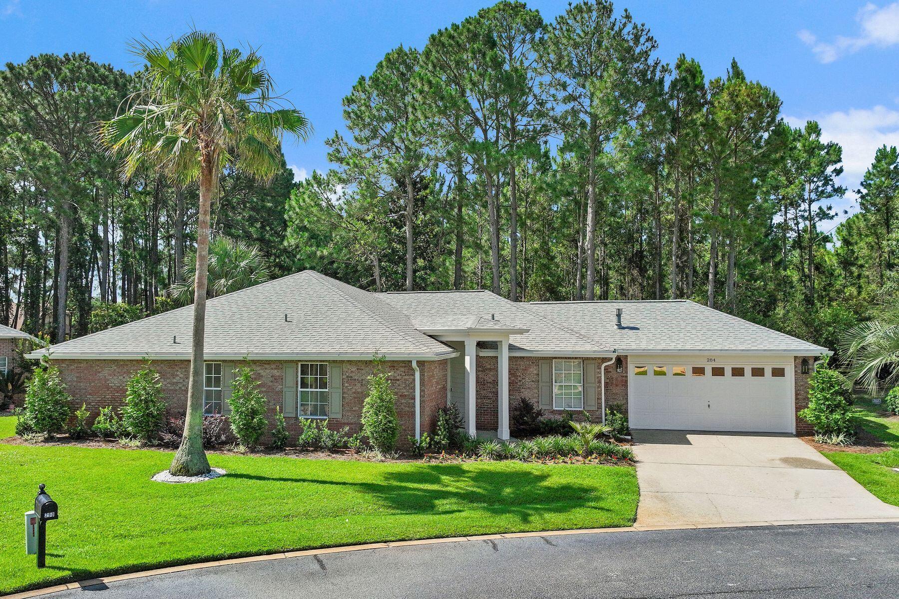 Thoughtfully redesigned and meticulously improved, this beautifully renovated Bayside residence offers the perfect blend of modern comfort, timeless style, and an exceptional location within one of Miramar Beach's most desirable bayfront communities. 

Set against a private wooded backdrop, the home enjoys a peaceful sense of seclusion while remaining just minutes from the area's renowned white-sand beaches, shopping, dining, and outdoor recreation. Inside, nearly every surface has been updated, creating a move-in-ready home that lives and feels like new. 

At the heart of the home, the custom-designed kitchen showcases soft-close cabinetry, quartz countertops, a custom range hood, gas range, stainless steel appliances, tile backsplash, undermount sink, and a stylish beverage bar--creating a space equally suited for everyday living and entertaining. The adjoining living area is warm and inviting, anchored by a gas fireplace and enhanced by recessed lighting, new fixtures, and refined finishes throughout. 

The home's extensive renovation continues into the bathrooms, where custom tile showers, built-in niches, and new vanities elevate the overall experience. Every detail has been carefully selected to create a cohesive and sophisticated interior. 

Adding exceptional versatility, the heated and cooled sunroom provides valuable additional living space and can easily serve as a home office, media room, fitness studio, guest retreat, or second living area. Significant capital improvements provide peace of mind, including a new roof (2020), new water heater (2023), epoxy-coated garage flooring, new gutters, new shutters, updated landscaping, irrigation system, and a welcoming new front entry door. 

Beyond the home itself, Bayside residents enjoy an unmatched coastal lifestyle with access to a community pool, tennis courts, pavilion, bayfront dock, and waterfront park. Fishing, kayaking, paddleboarding, and sunset walks along the bay become part of everyday life. Just outside the neighborhood, residents also enjoy convenient access to a public boat launch, pickleball courts, playgrounds, and additional recreational amenities. 

Located behind Silver Sands Premium Outlets and only a short drive to the beach, this exceptional property offers the rare combination of a fully renovated home, abundant community amenities, and a premier location between the bay and the Gulf. Whether as a primary residence, second home, or investment property, this is a home designed to be enjoyed from the moment you arrive.