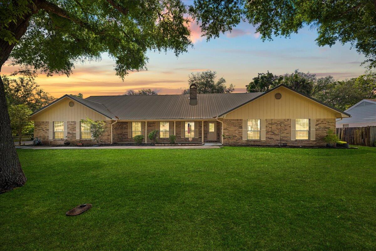 Welcome to 121 Edwards Lane in Fort Walton Beach--a standout property offering exceptional space rarely found in this highly sought after Elliot Point neighborhood. Generously sized bedrooms provide comfort and flexibility, while oversized living areas are ideal for entertaining or relaxing. The upstairs bonus room would make a great game room, home theater, or extra retreat. An additional flex room offers potential for attached separate living quarters for aging parents, guests, or extended family. Step outside to a private backyard oasis with a pool, beautiful landscaping, and plenty of room to unwind. A durable metal roof and classic brick exterior add lasting value and curb appeal. A rare opportunity to own a home with this much square footage in Elliot Point.-- Don't Miss!