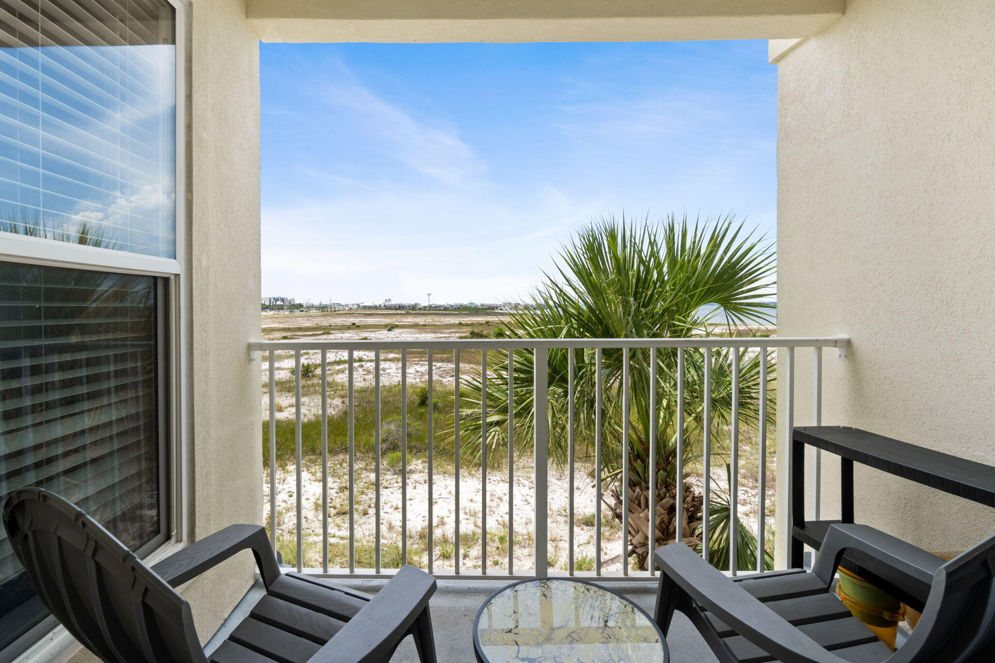 GULF AND SOUND VIEWS in this adorable 1 bedroom/2 bathroom condo.  Inside you will find sleeping for 6-8 guests; a large kitchen with breakfast bar and a private balcony with views of the Gulf and the Sound. The unit boasts hallway bunk beds for the little ones and stackable washer/dryer.  All furnishings, appliances and decor stay. Outside is a nice community pool with showers, restrooms and a grilling area. Enjoy the Public Beach just 800 feet away.  Bicycle, jog or walk on the newly paved sidewalks along Gulf Boulevard.  Restaurants, bars and shopping are all within walking distance.  Best yet? Gulf Island condominiums are situated right on Gulf Blvd so set up your chairs and watch the Mardi Gras or Christmas Parades!
